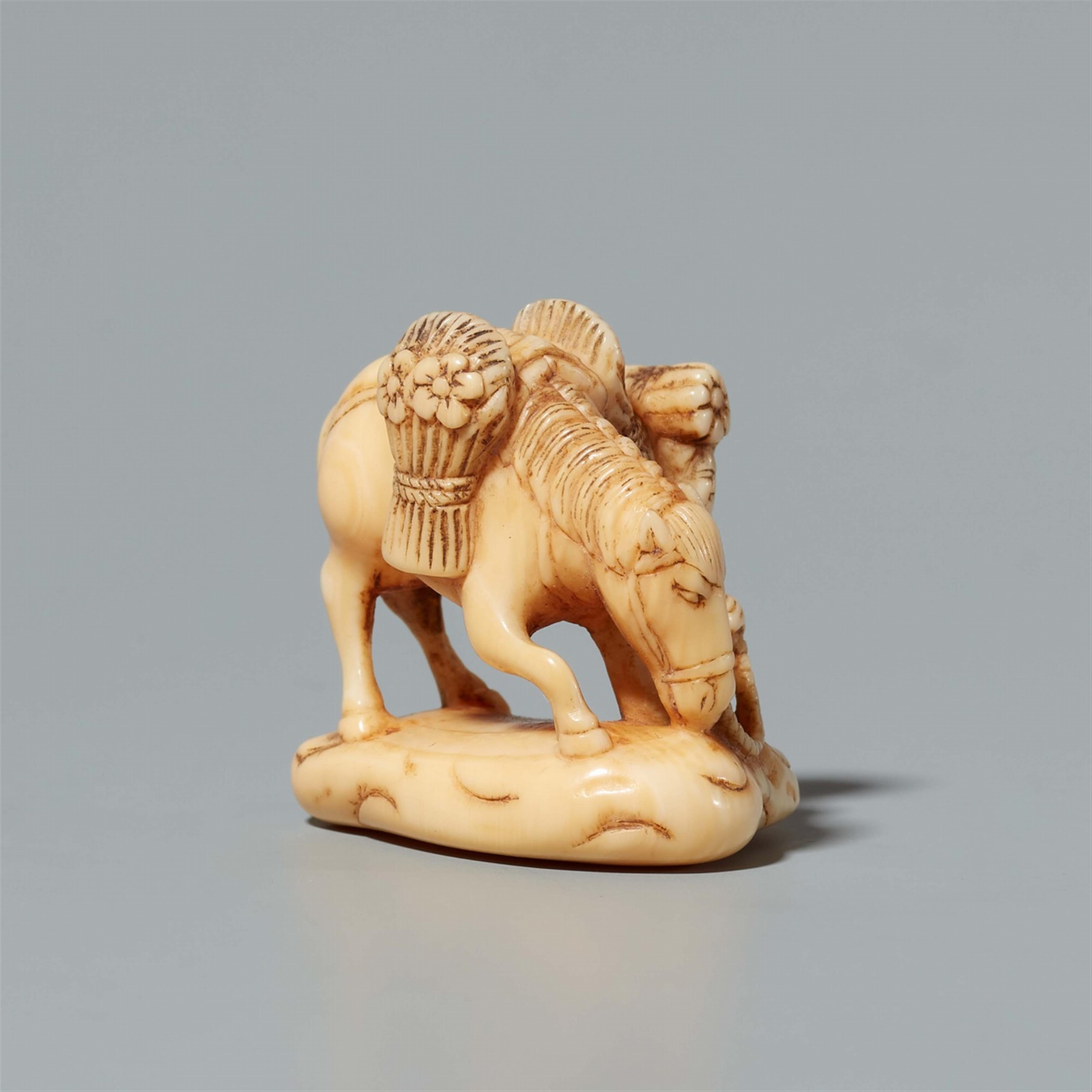 An ivory okimono netsuke of a farmer and a horse. Mid-19th century - image-2