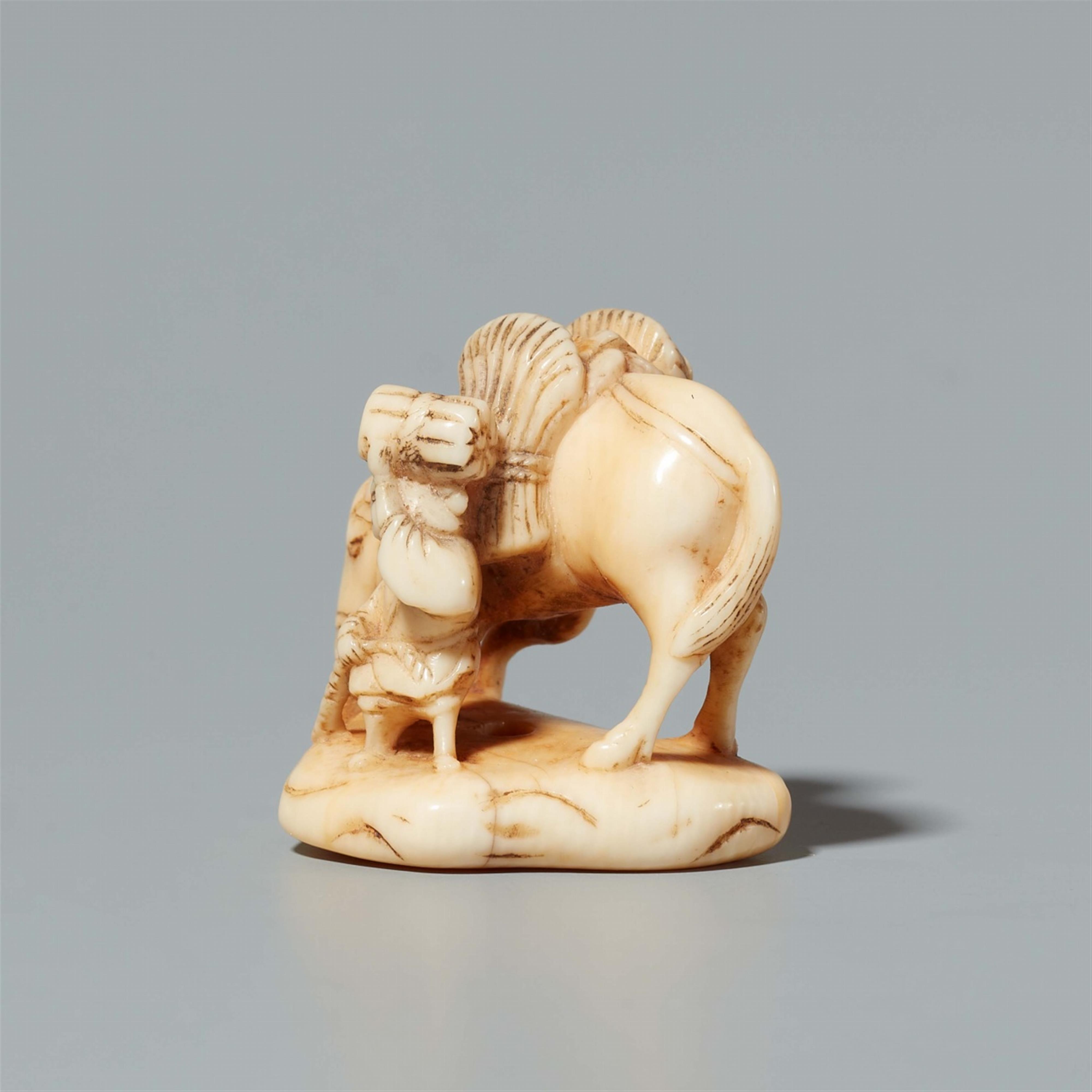 An ivory okimono netsuke of a farmer and a horse. Mid-19th century - image-4