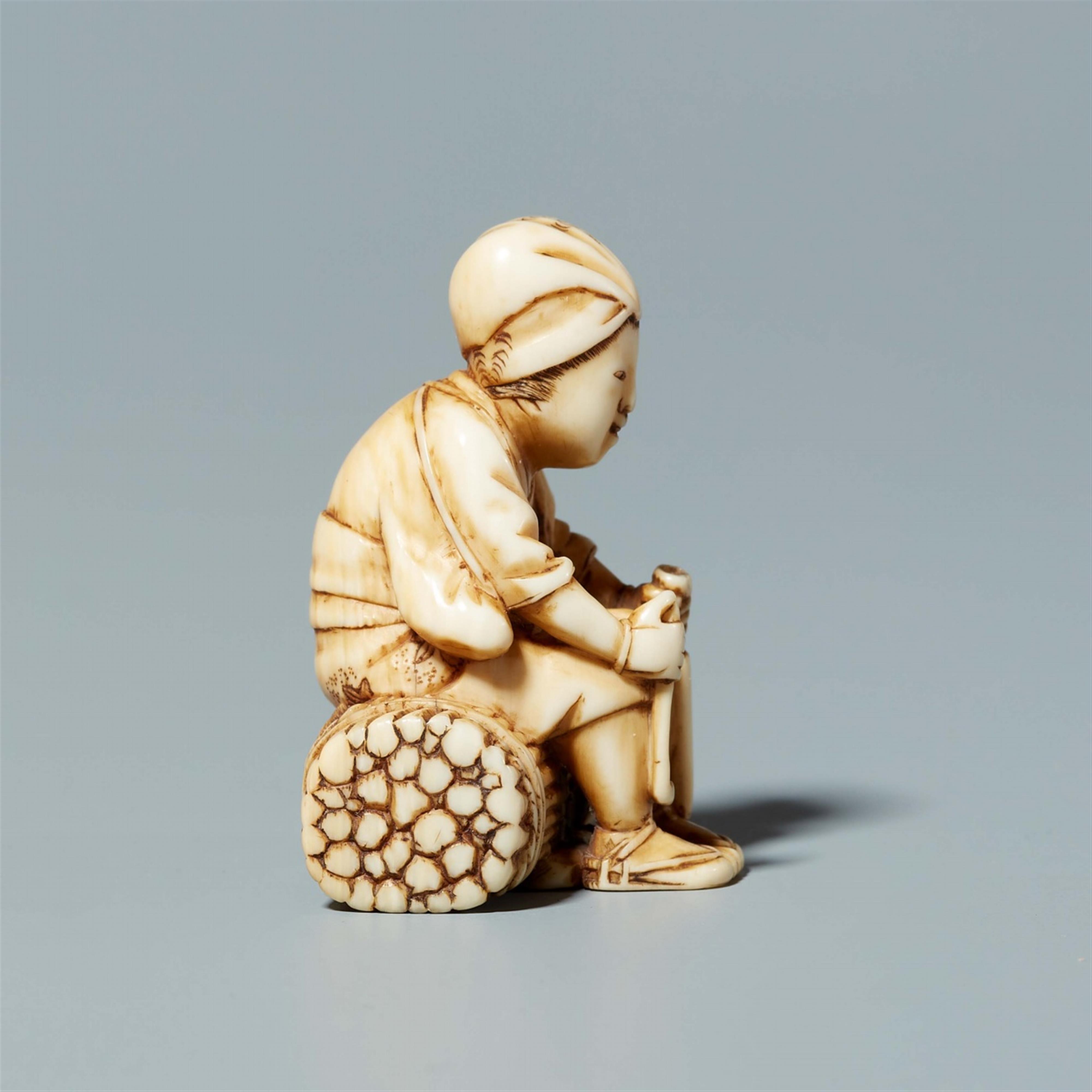 An ivory netsuke of a farmer, by Tomochika. Mid-19th century - image-2