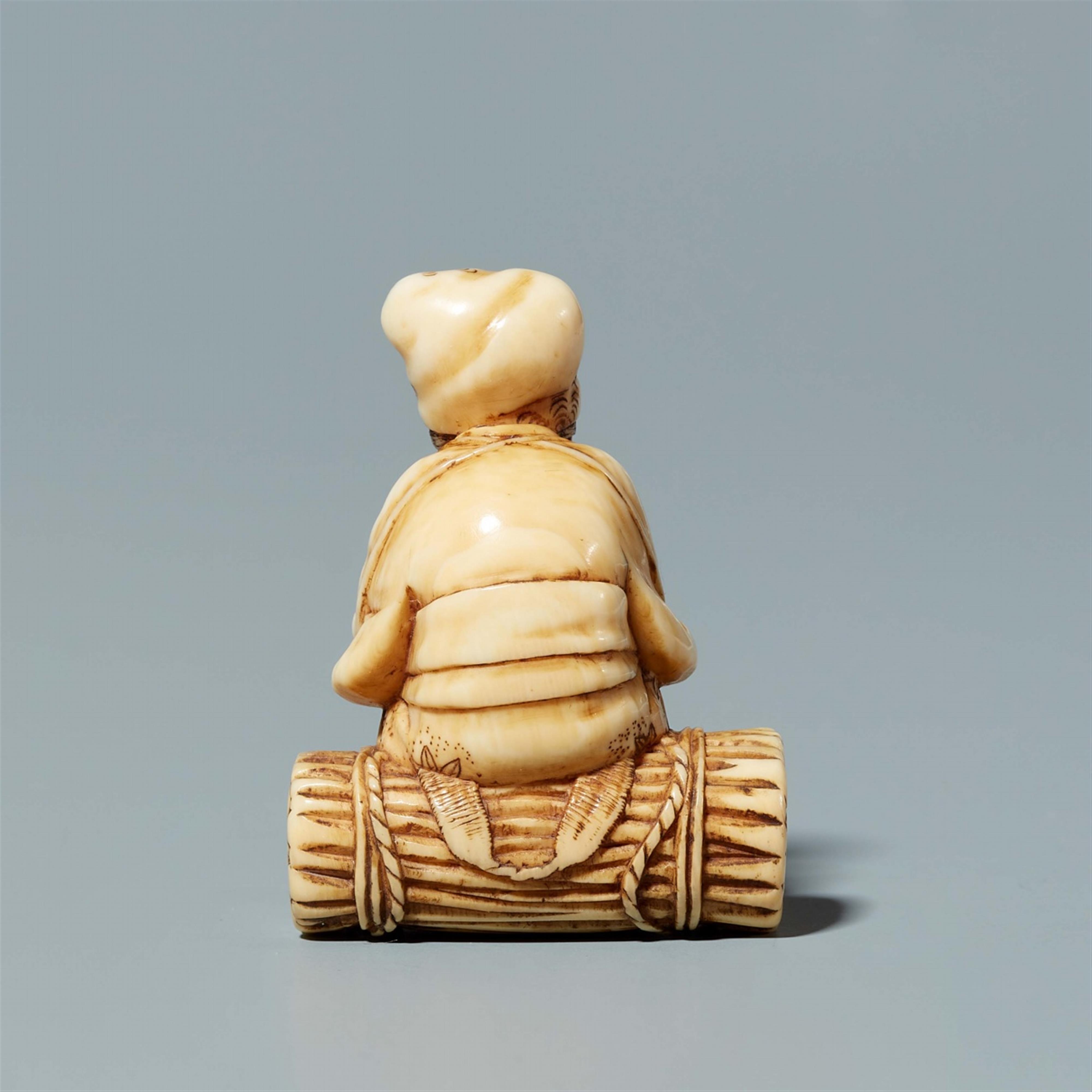 An ivory netsuke of a farmer, by Tomochika. Mid-19th century - image-3