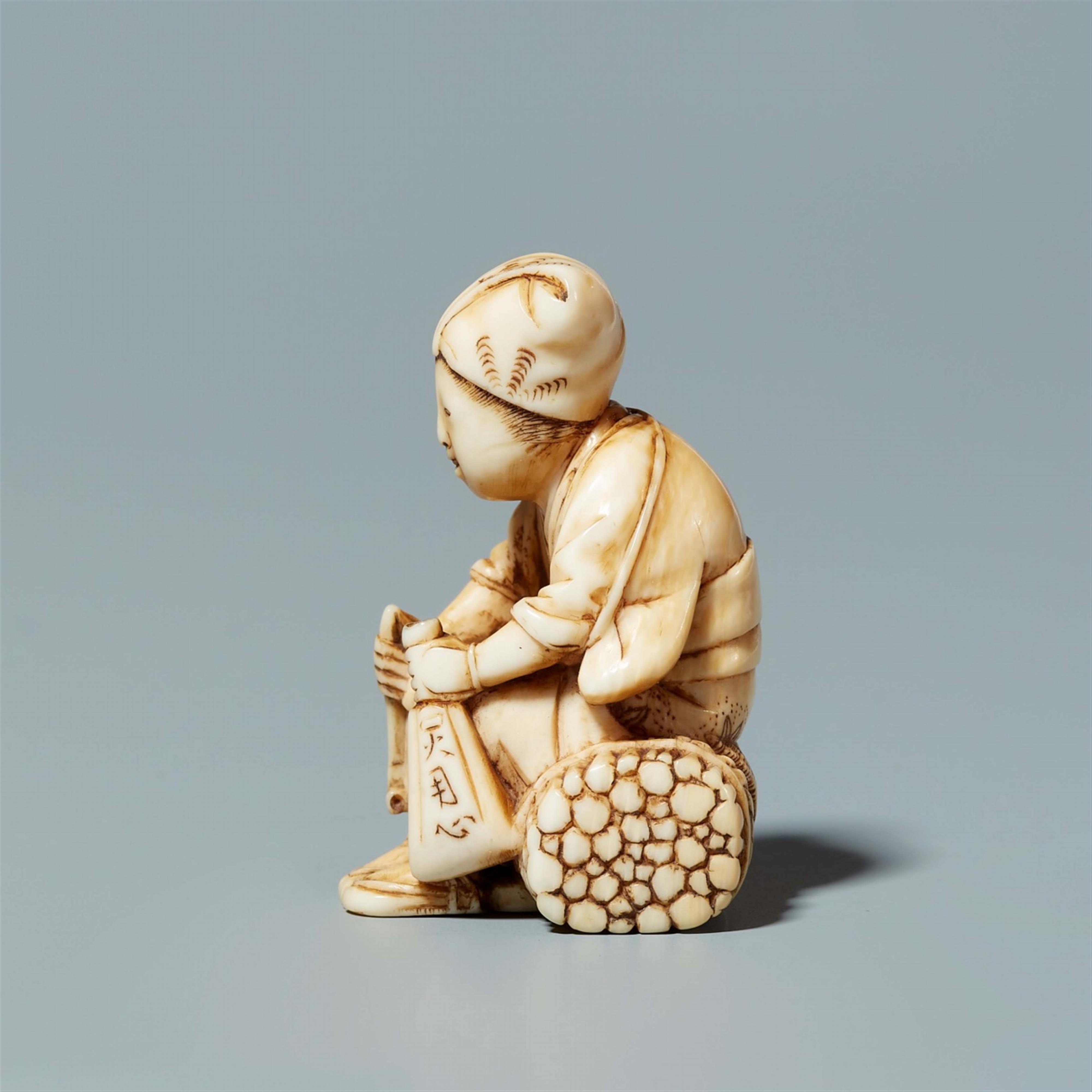 An ivory netsuke of a farmer, by Tomochika. Mid-19th century - image-4