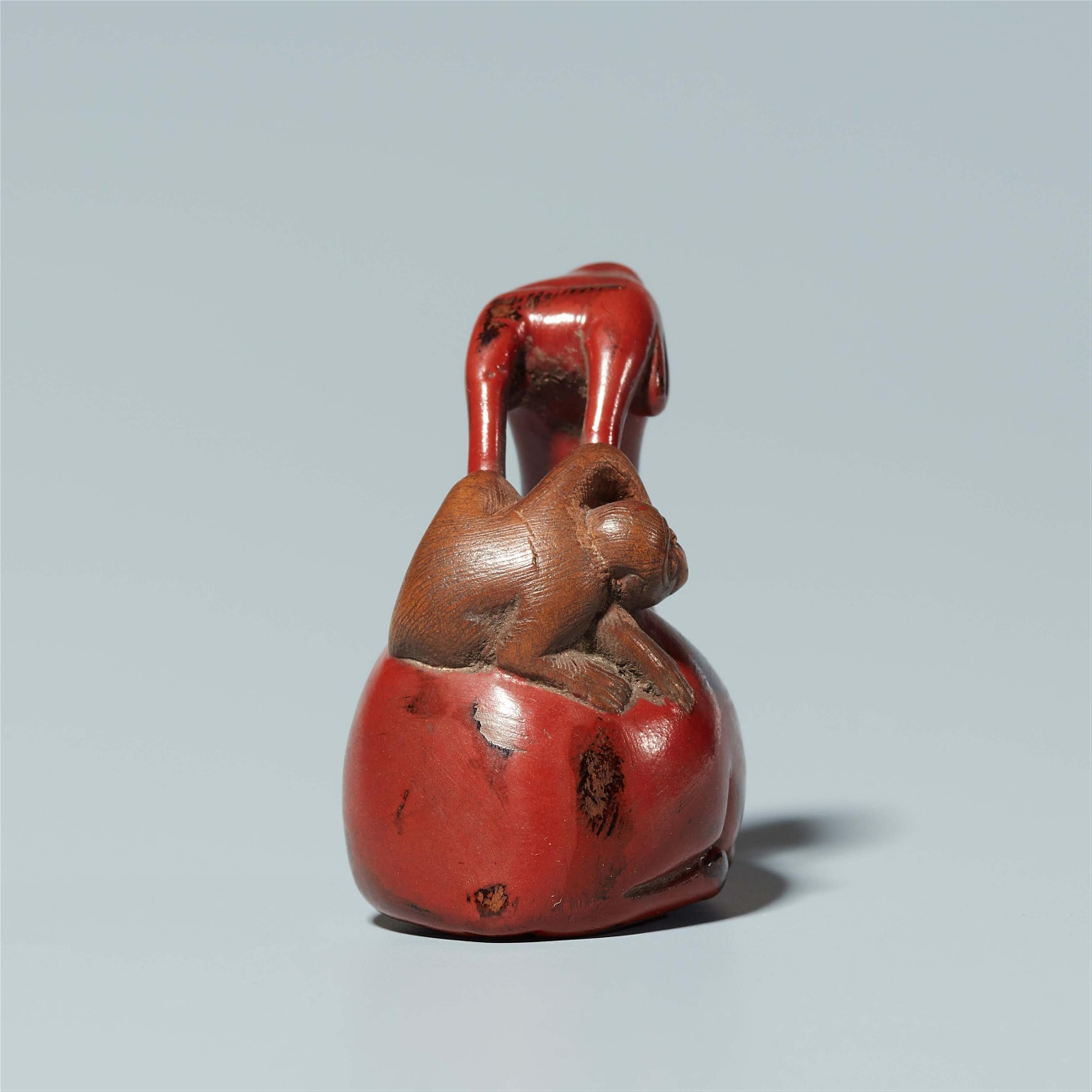 A lacquer on wood netsuke of a monkey on a deer. 18th century - image-4