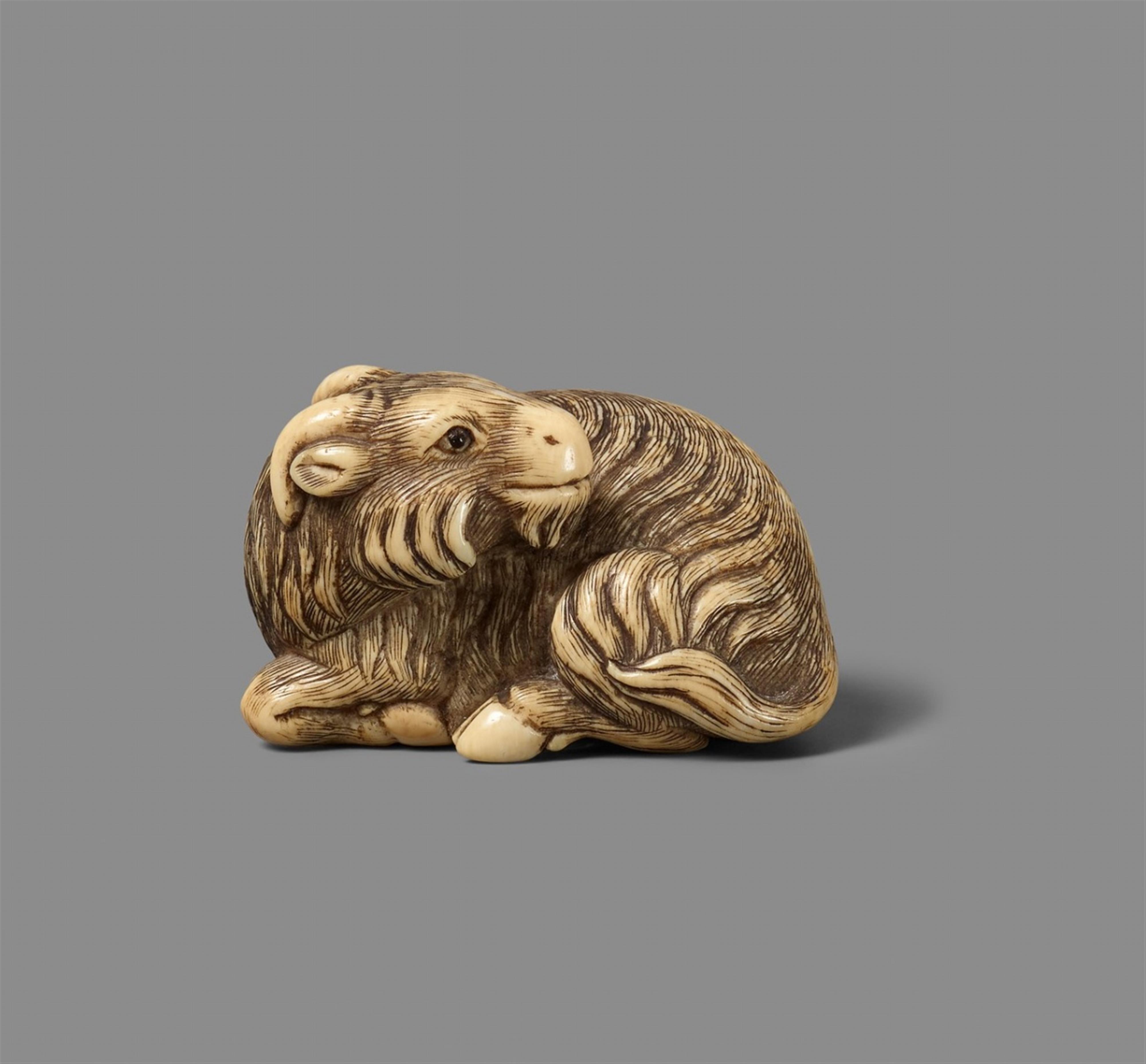 A Tokyo school ivory netsuke of a goat. 18th century - image-1