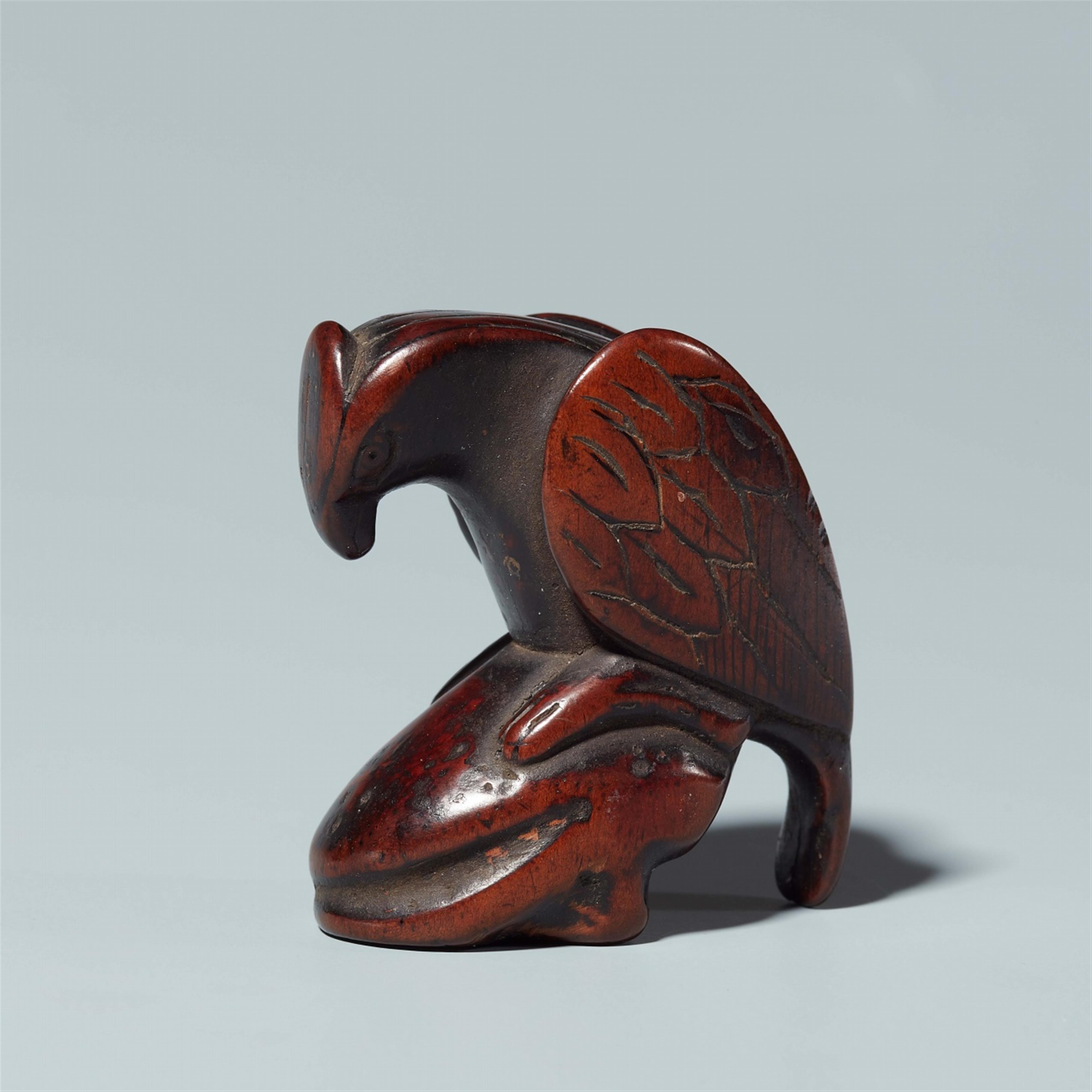 A wood netsuke of an eagle on a rock. 18th century - image-1