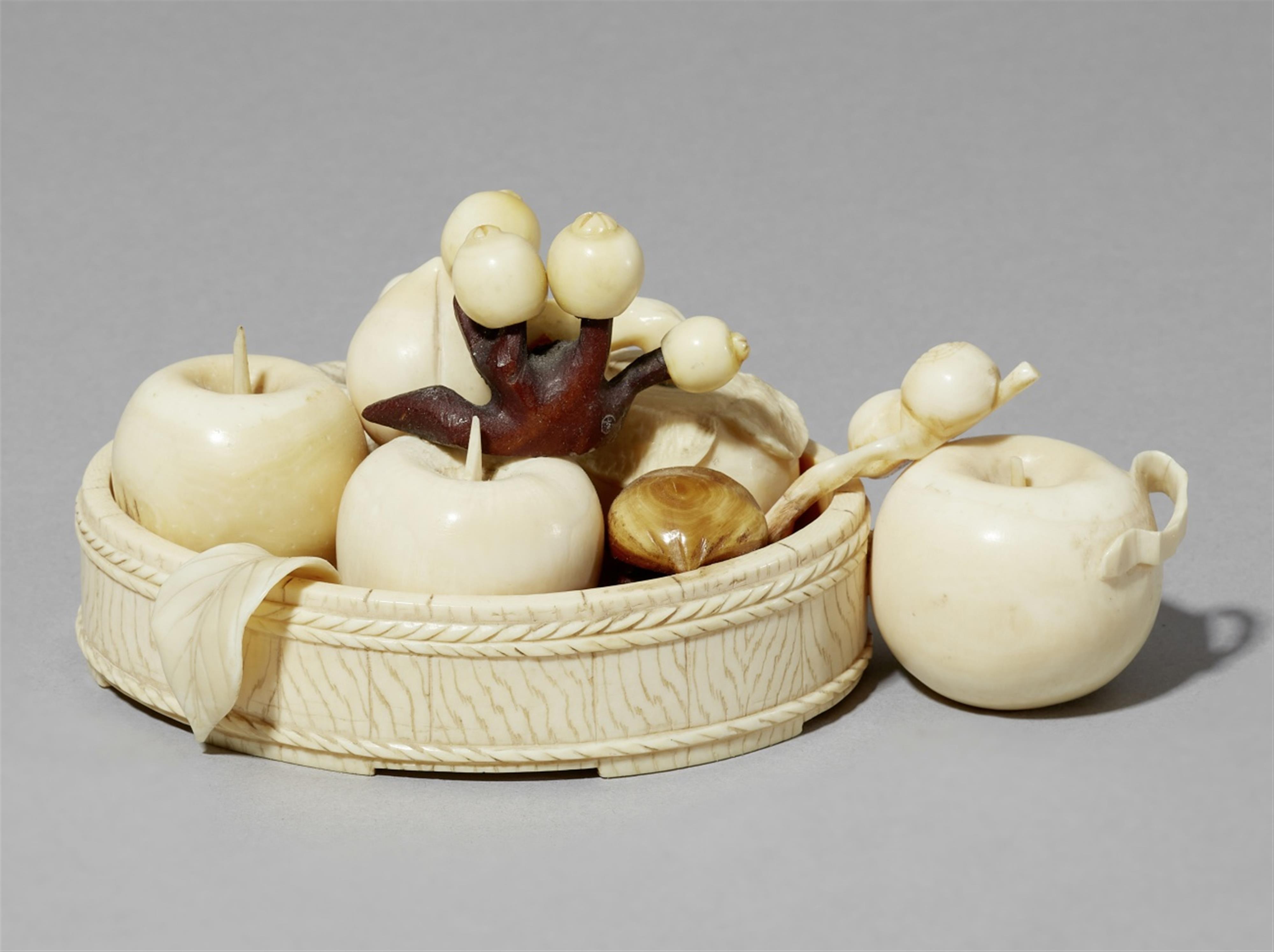 An ivory okimono of a fruit and vegetable still life. Tokyo. Late 19th century - image-1