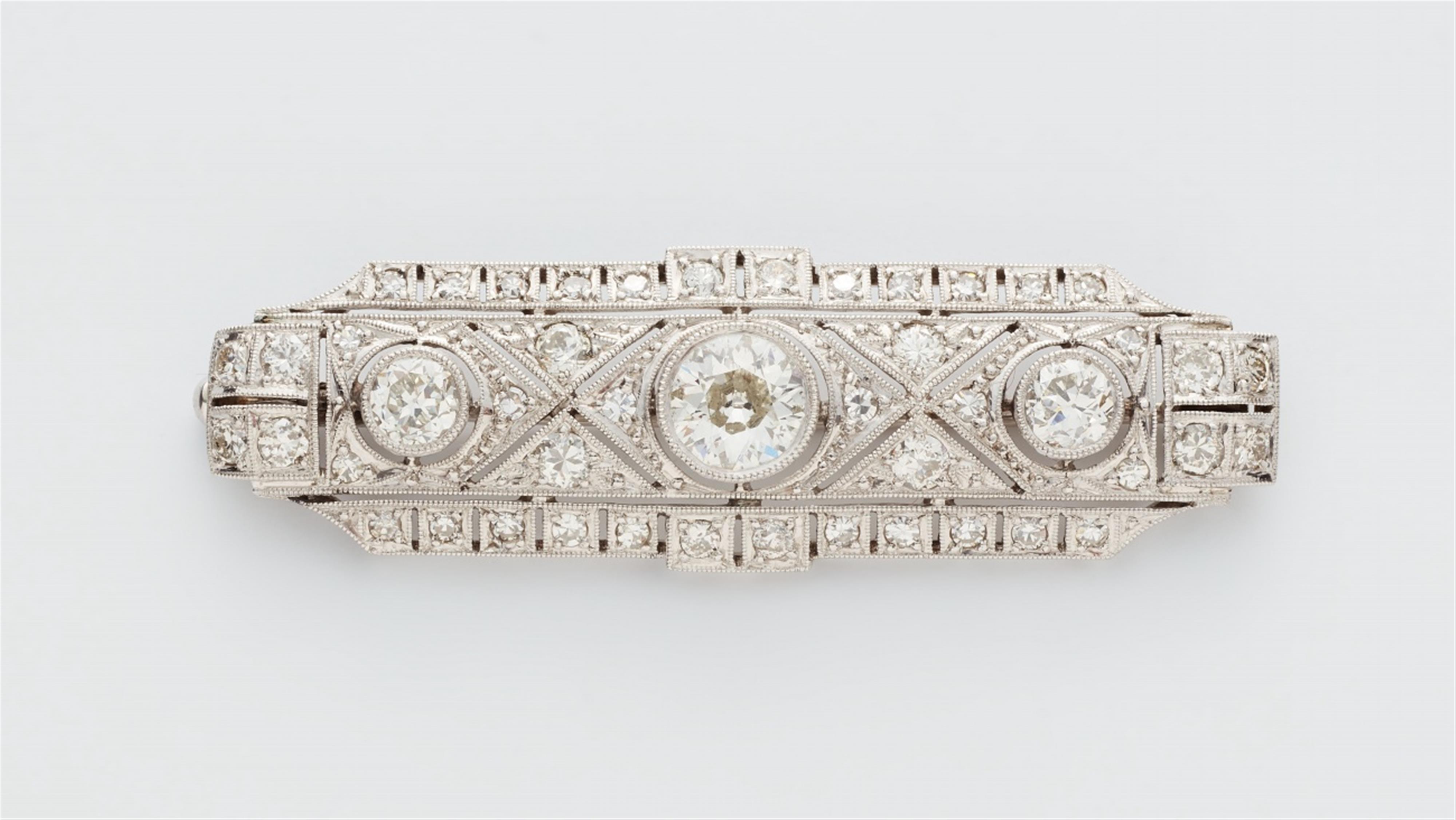 An Art Deco 14k white gold diamond brooch - image-1
