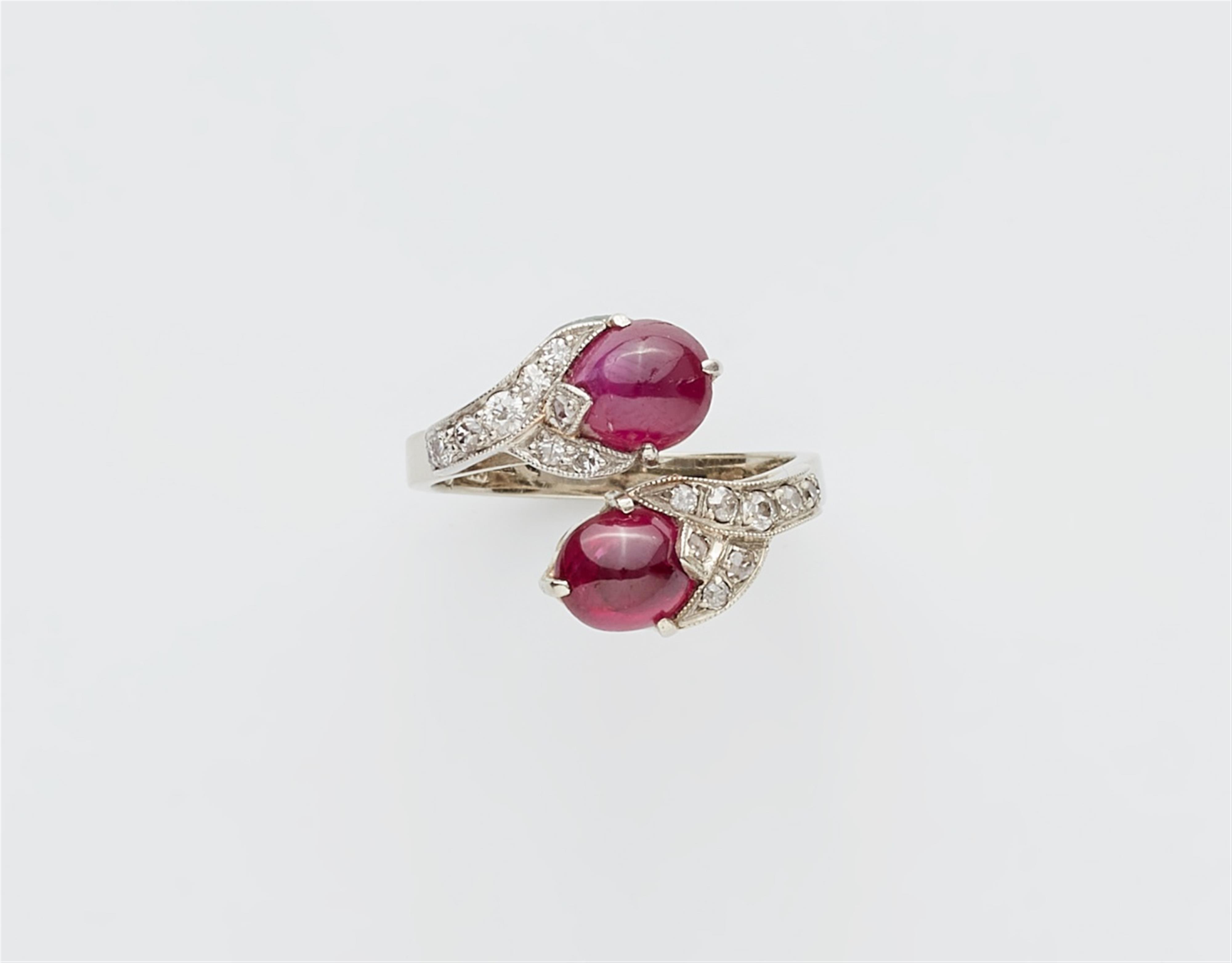 A 14k white gold ruby crossover ring - image-1