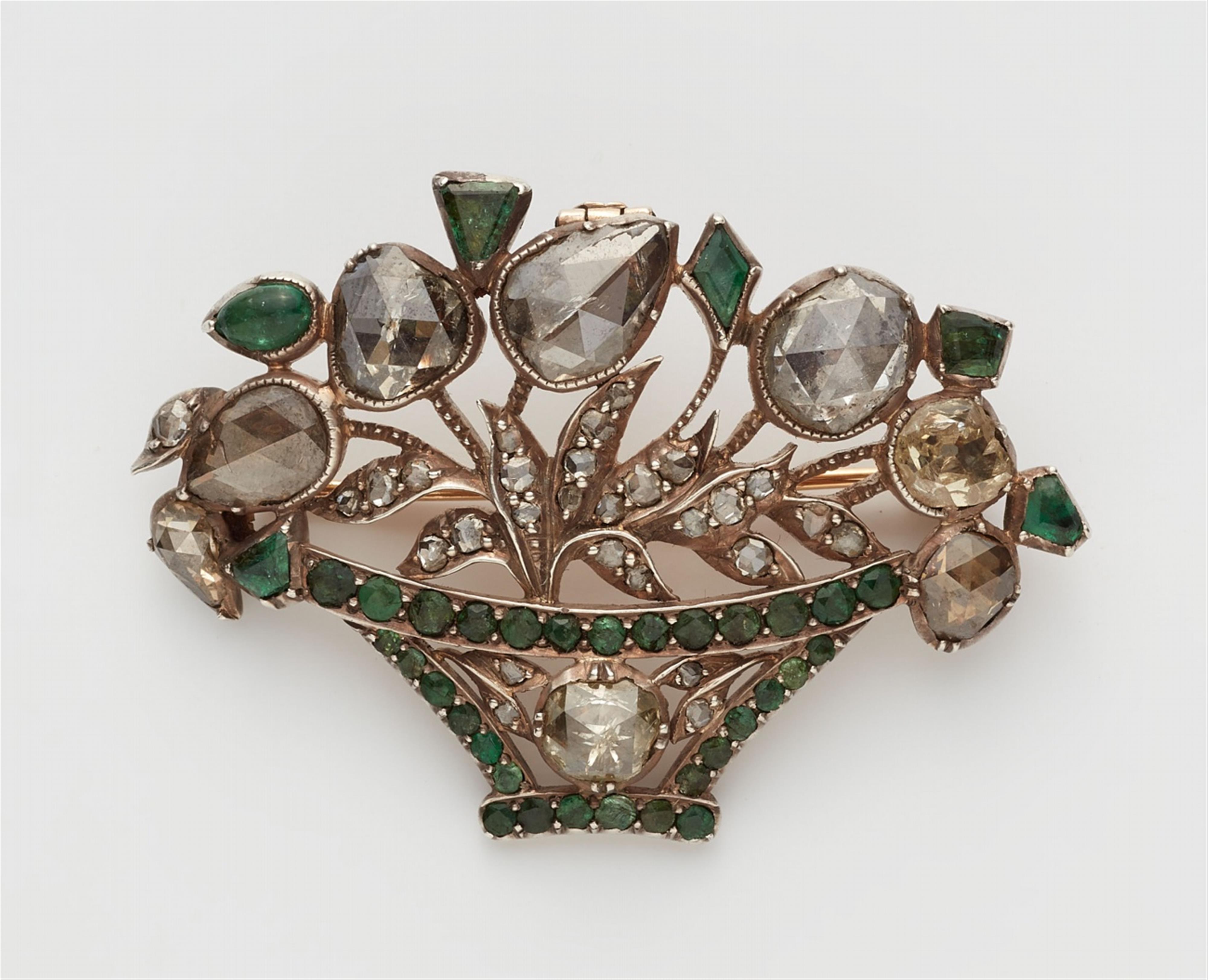 A large diamond and emerald Giardinetti brooch - image-1