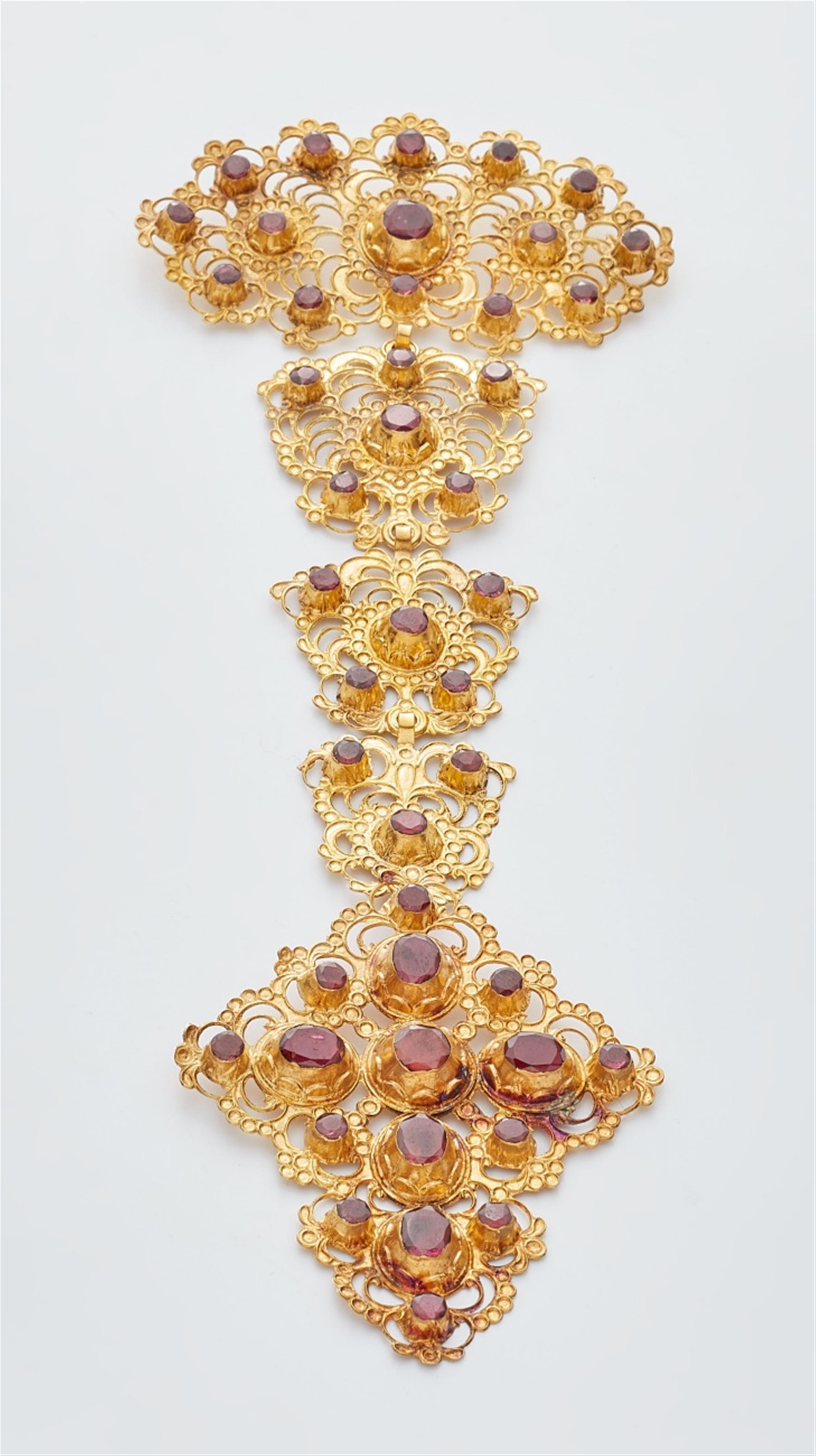 A large gold garnet corsage ornament - image-2