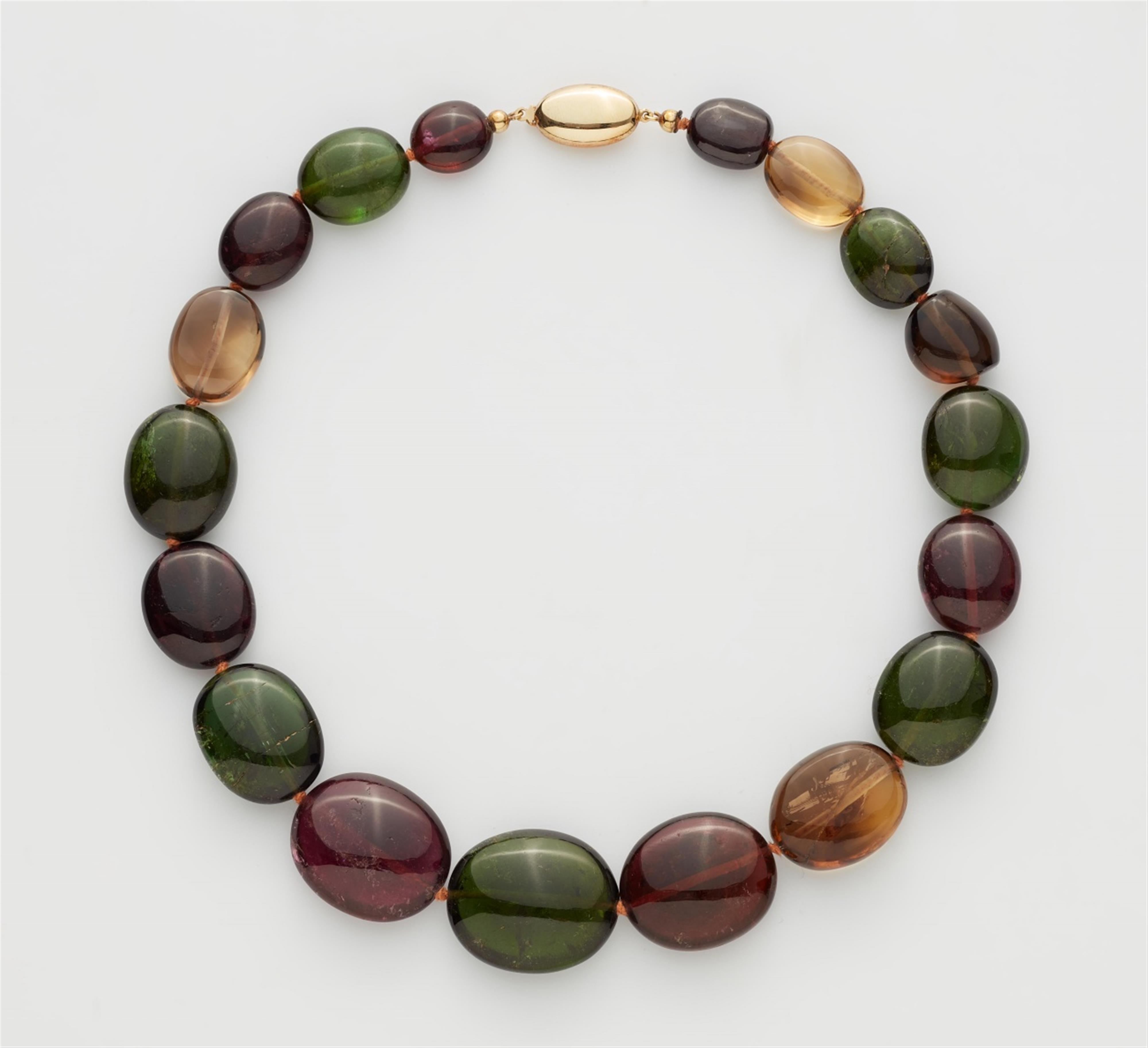 A 14k gold and tourmaline necklace - image-1