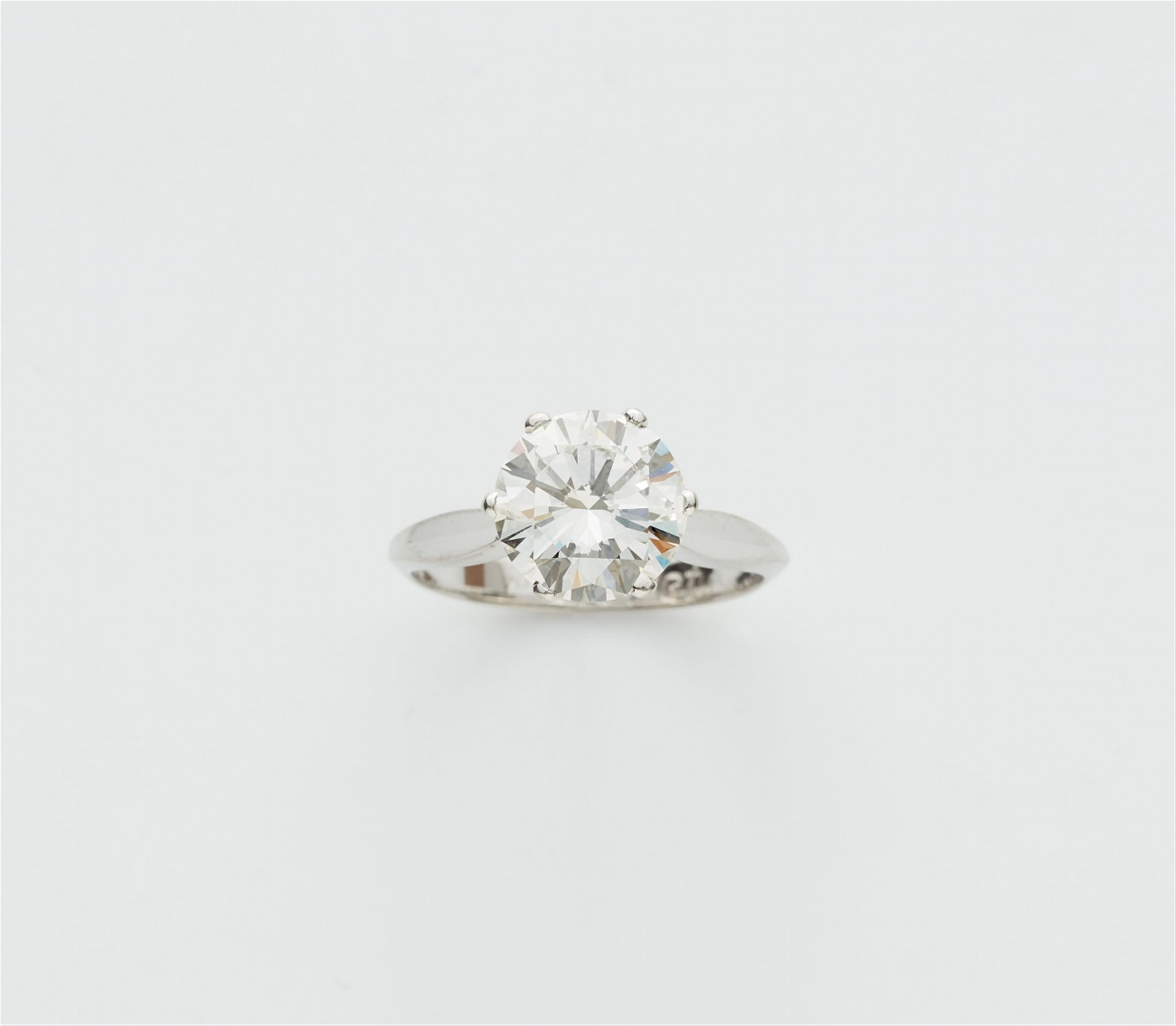 A platinum ring with a 2.67 ct diamond solitaire - image-1