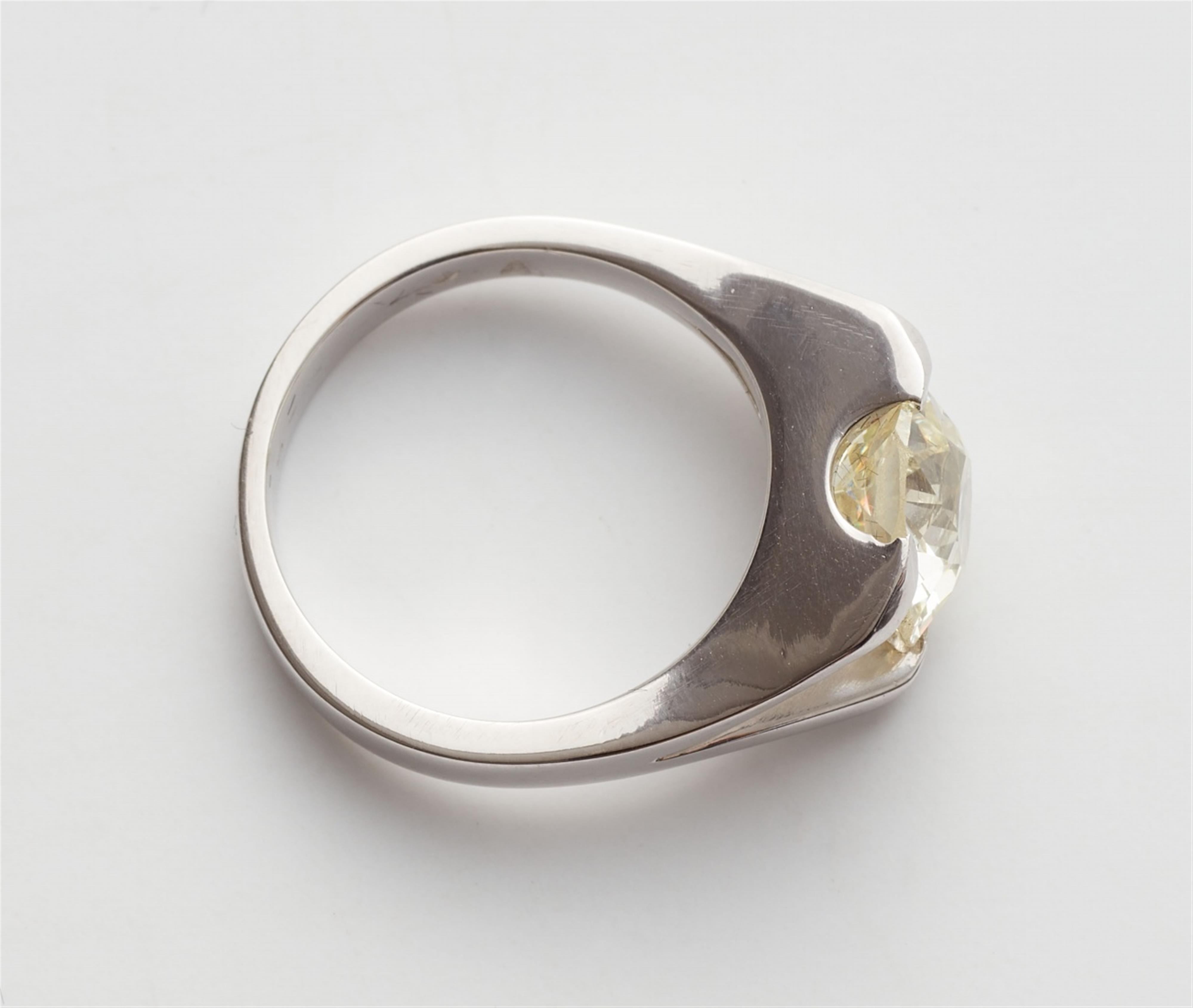 A platinum diamond solitaire ring - image-2