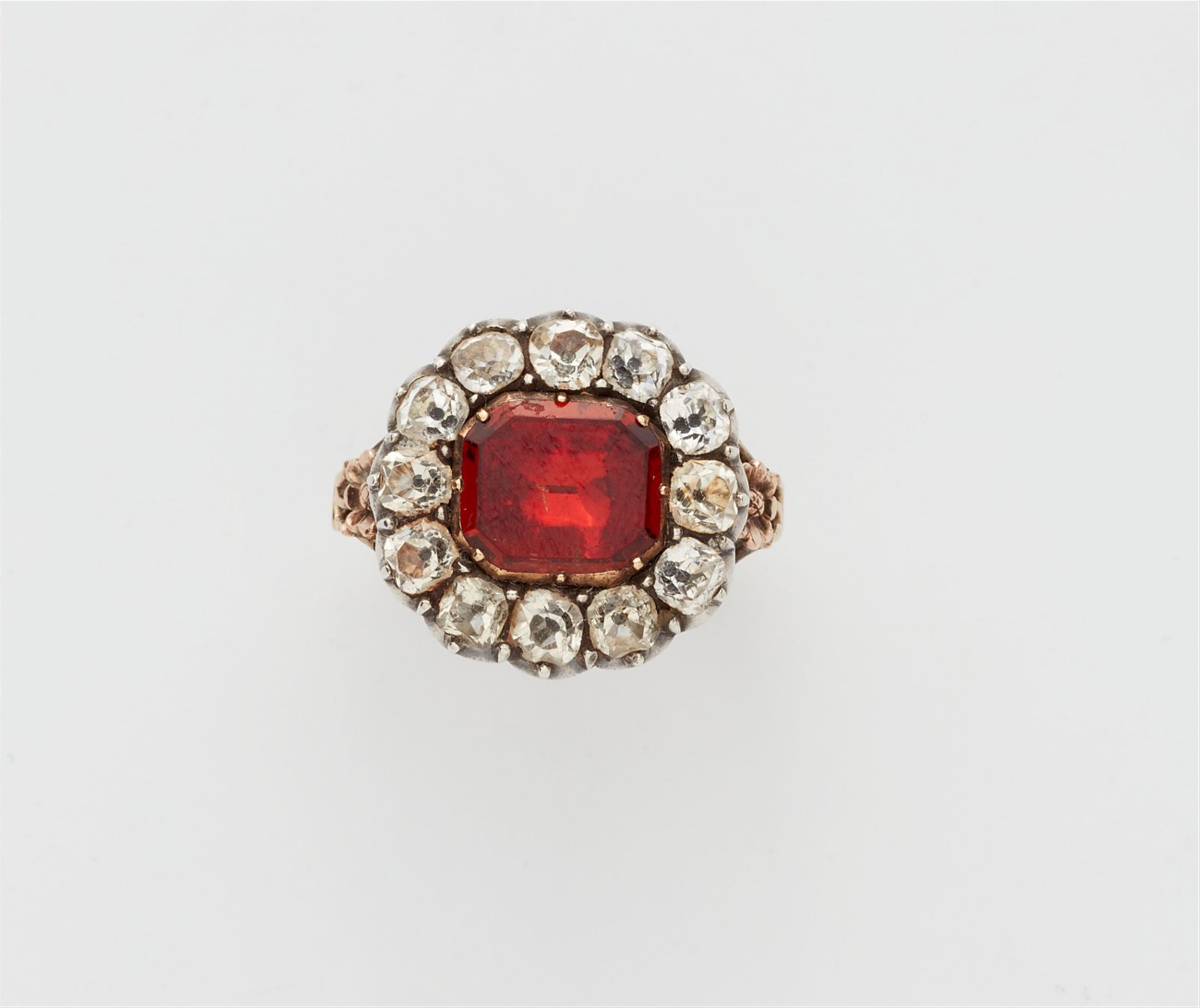 A George III 15k gold garnet ring - image-1