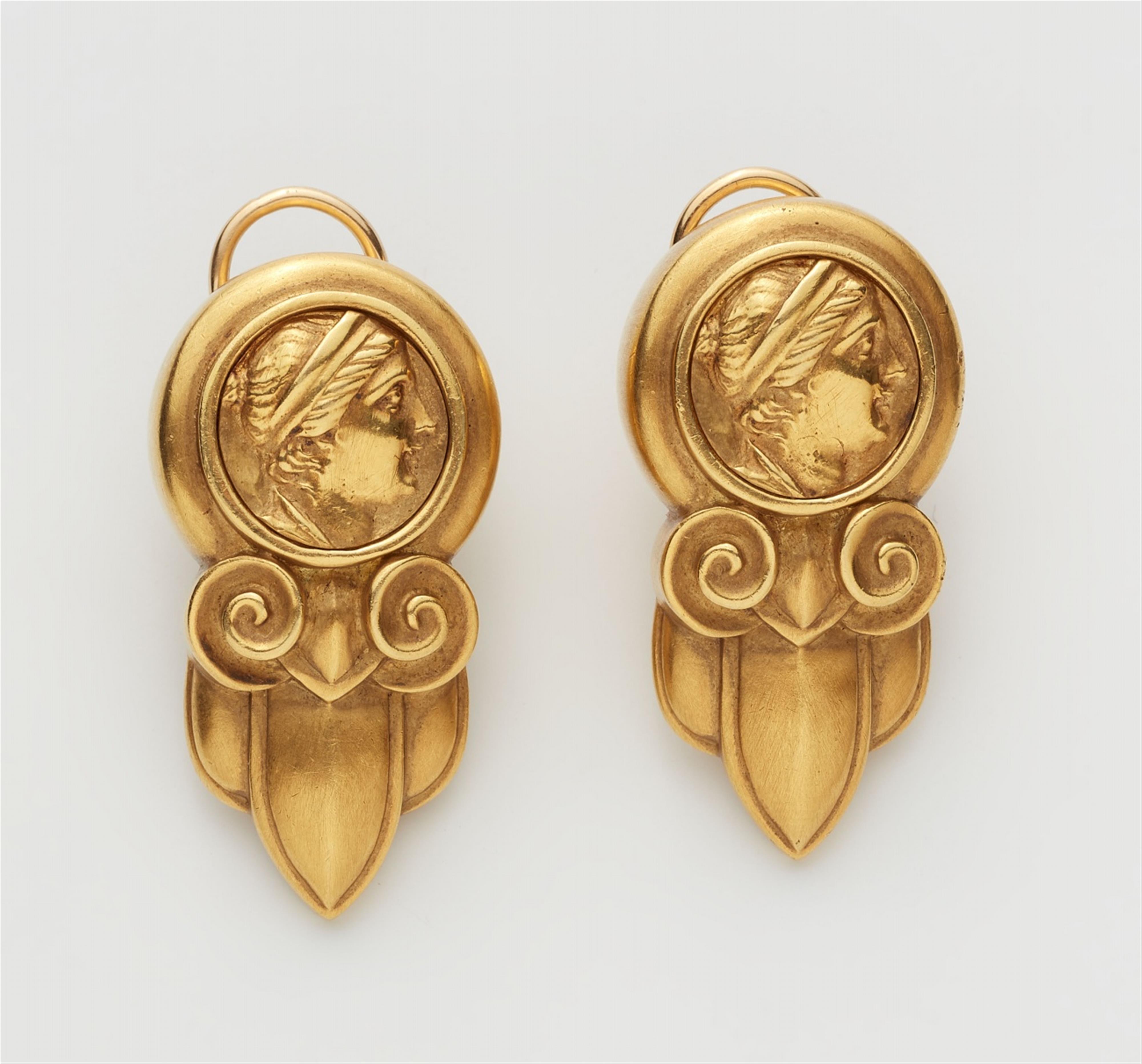 A pair of 18k gold clip earrings in the Revivalist style - image-1
