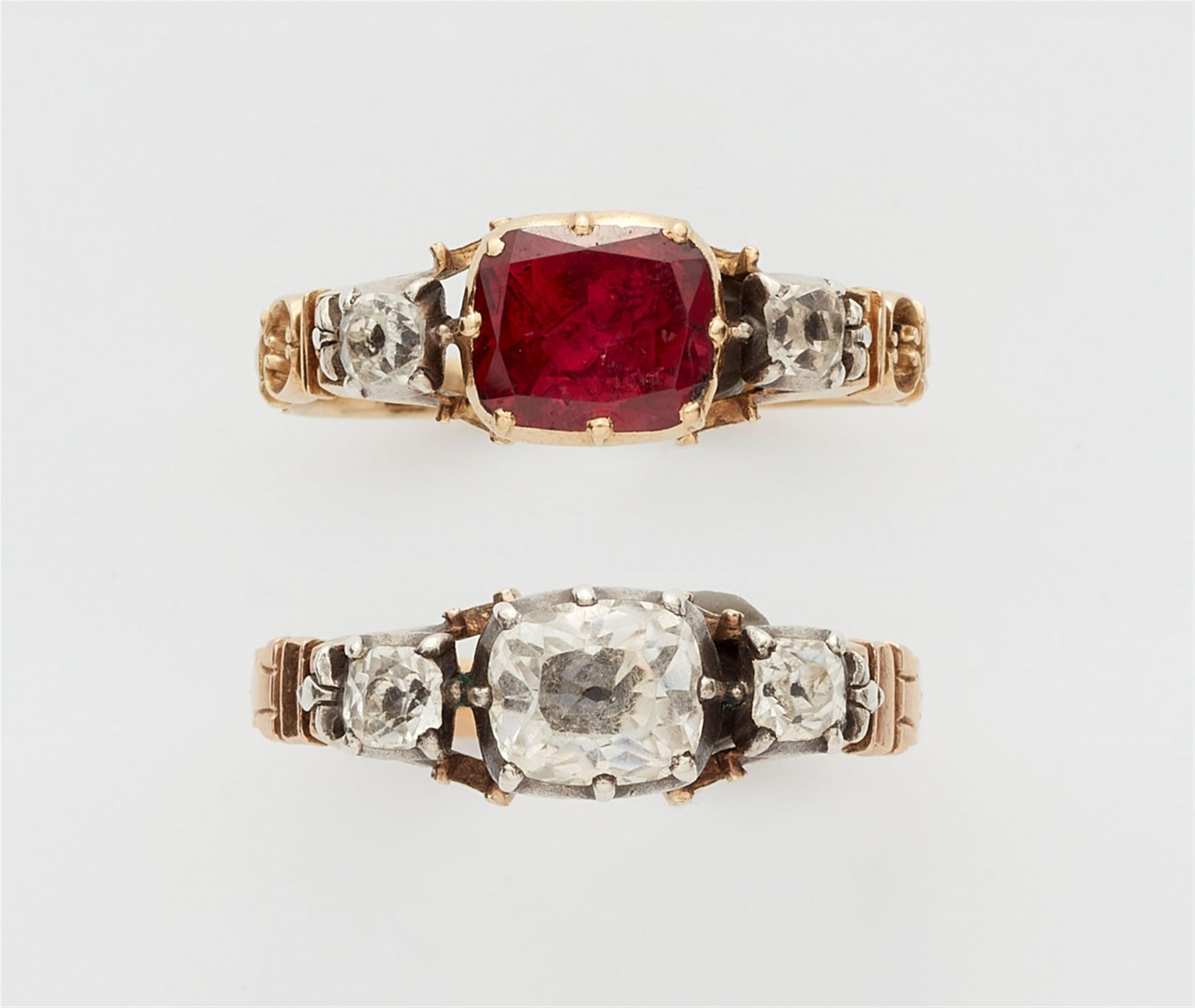 A pair of George III three stone rings - image-1