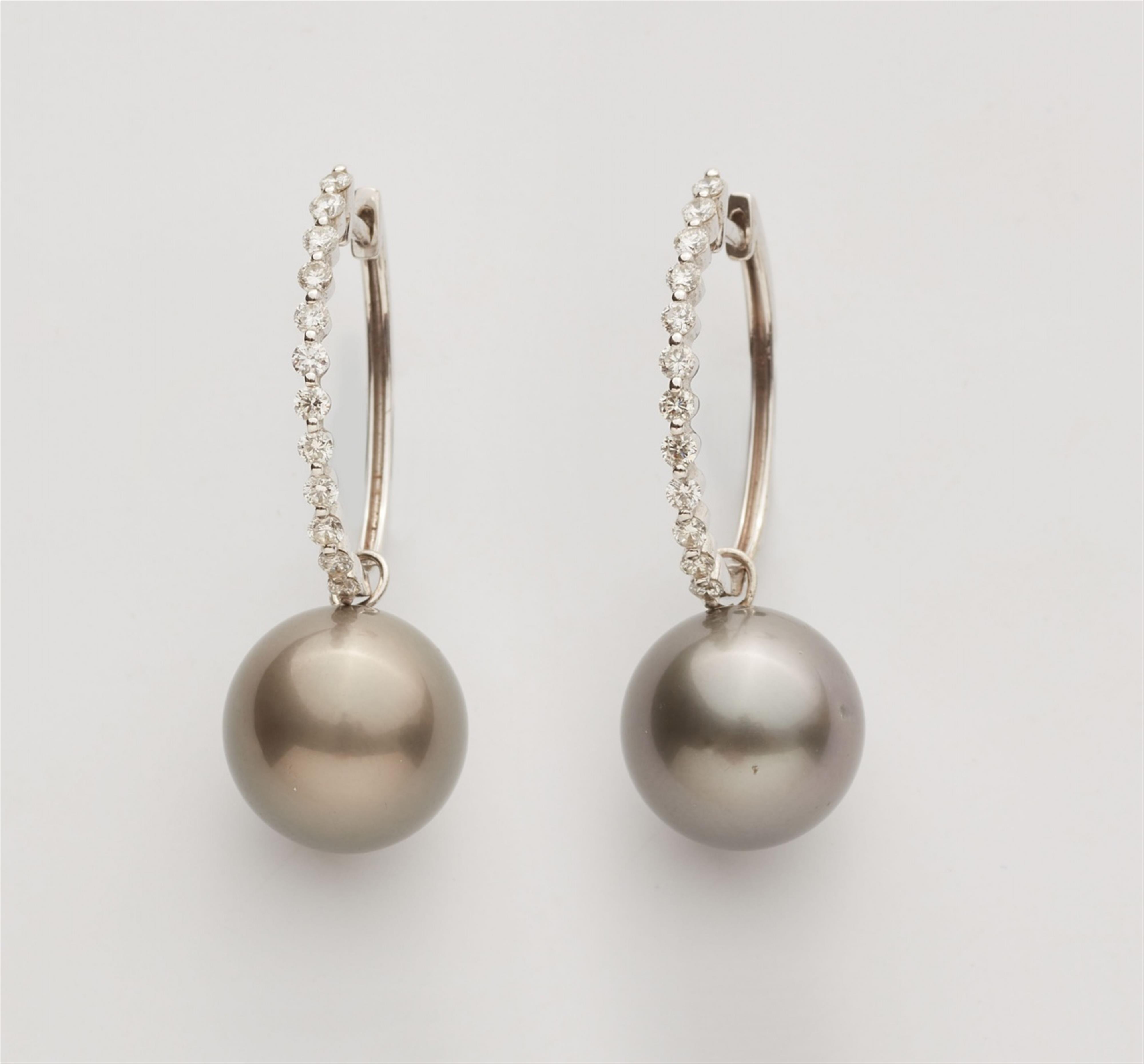 A pair of 14k white gold Tahiti pearl earrings - image-1