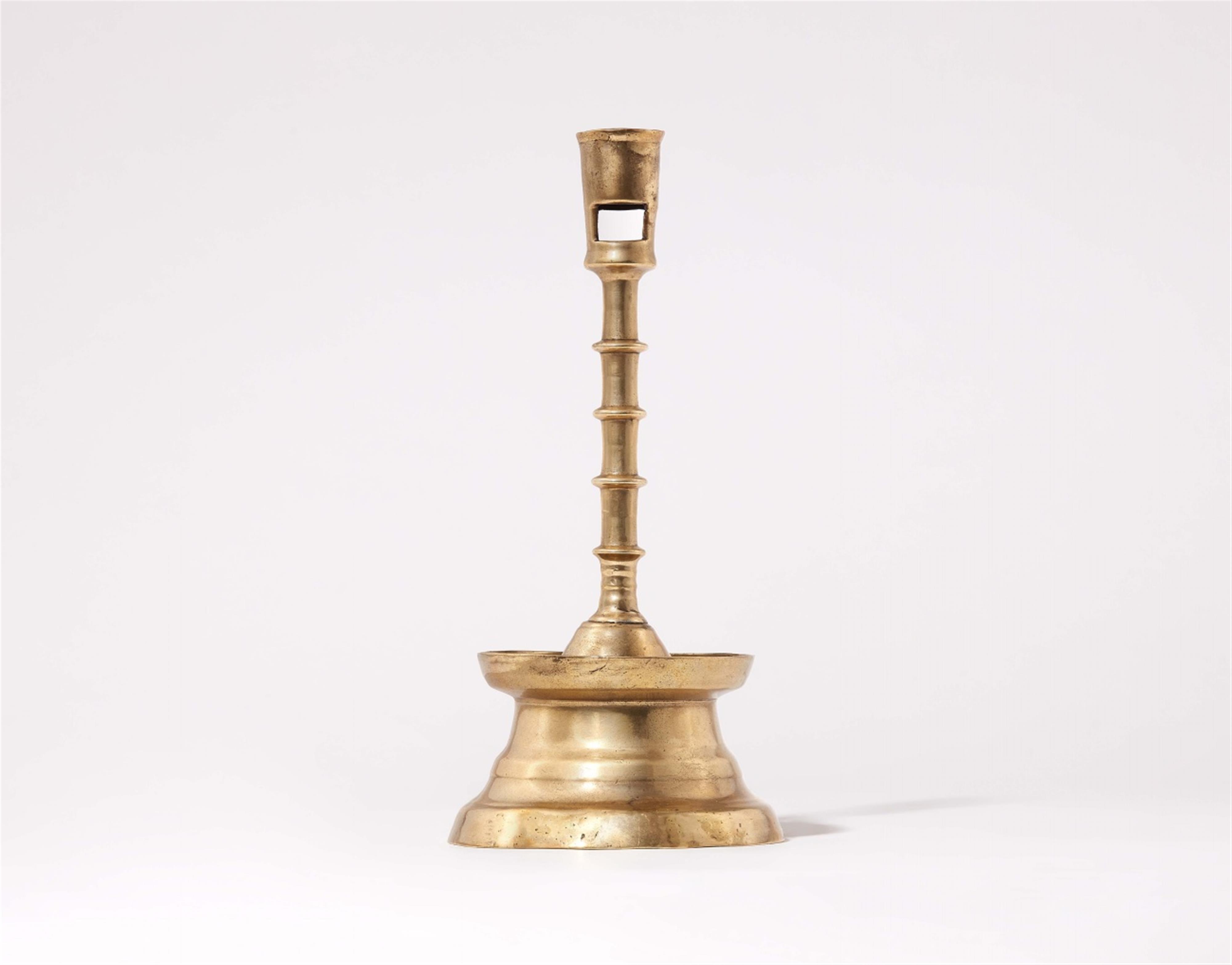 A late Gothic brass candelabra - image-1