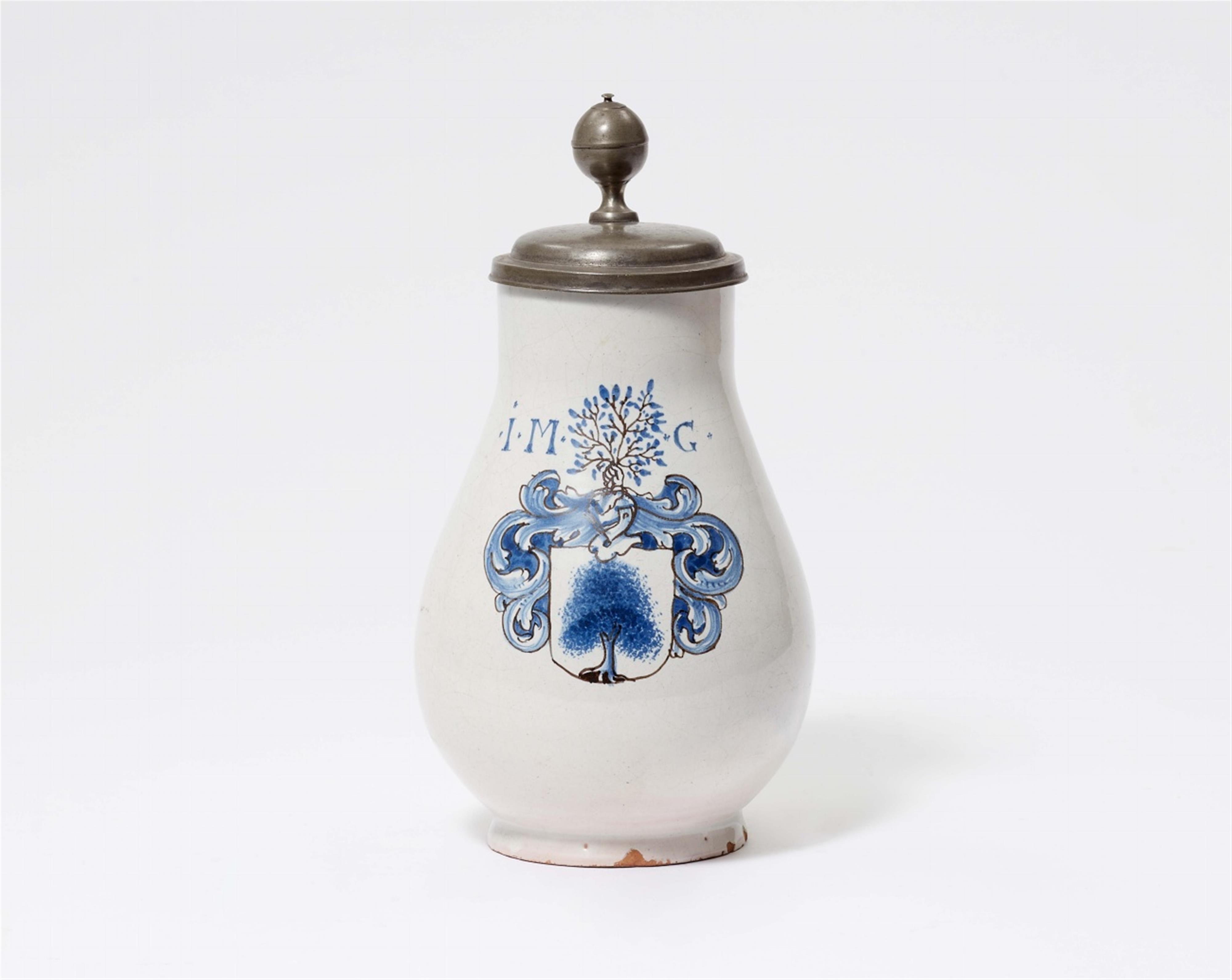 A Hanau faience pitcher with a coat of arms - image-1