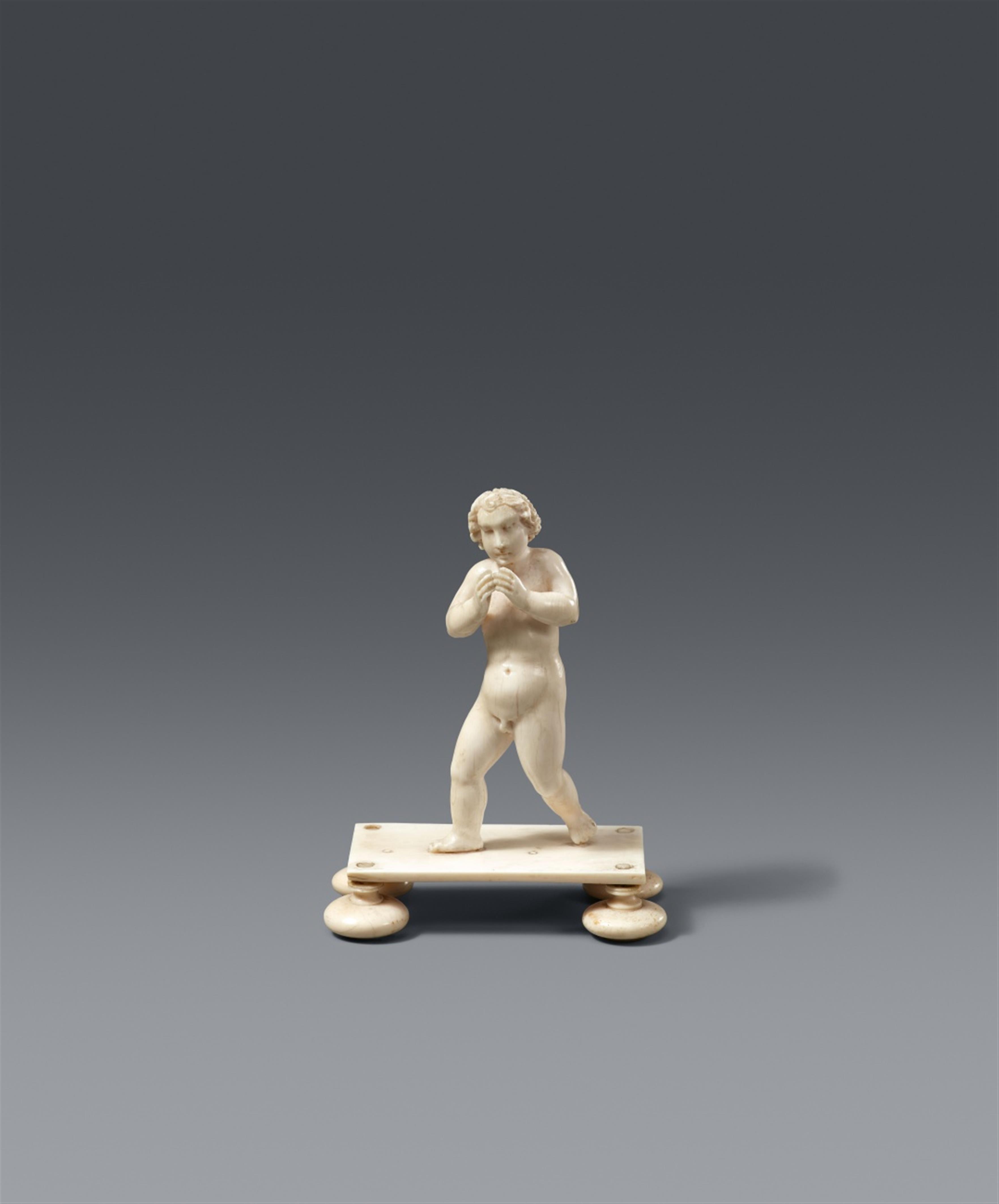 South German 17th century - A 17th century South German carved ivory figure of a nude youth - image-1