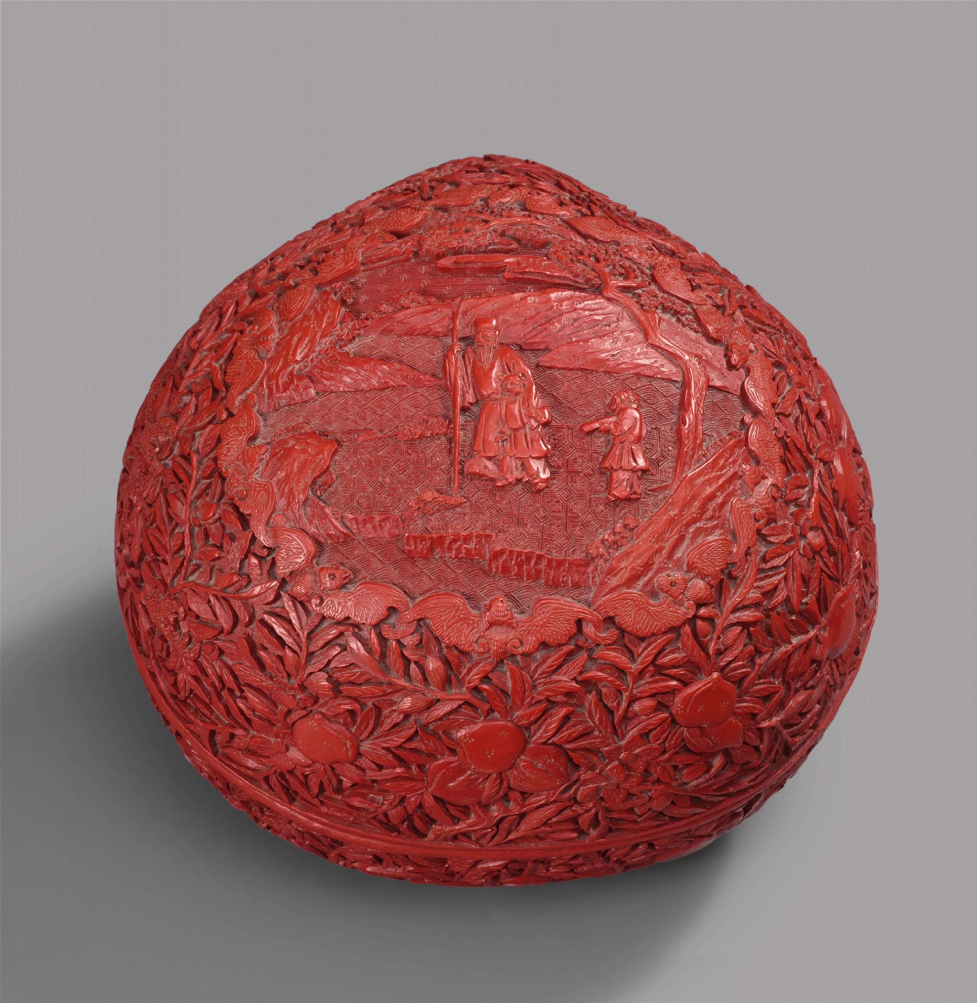 A carved red lacquer peach-shaped box and cover. 18th/19th century - image-1