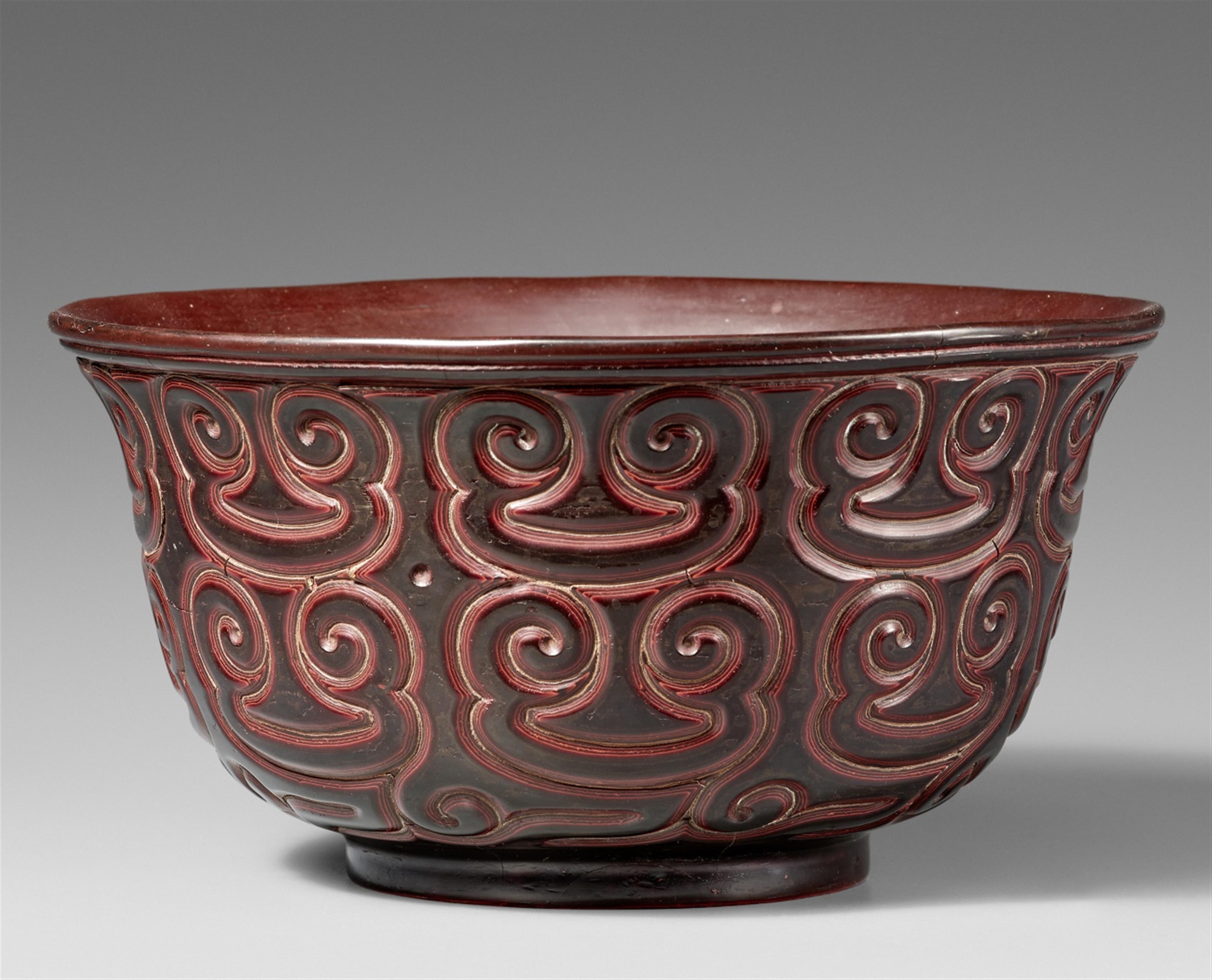 A carved black and red guri lacquer bowl. China or Japan. 18th/19th century - image-1