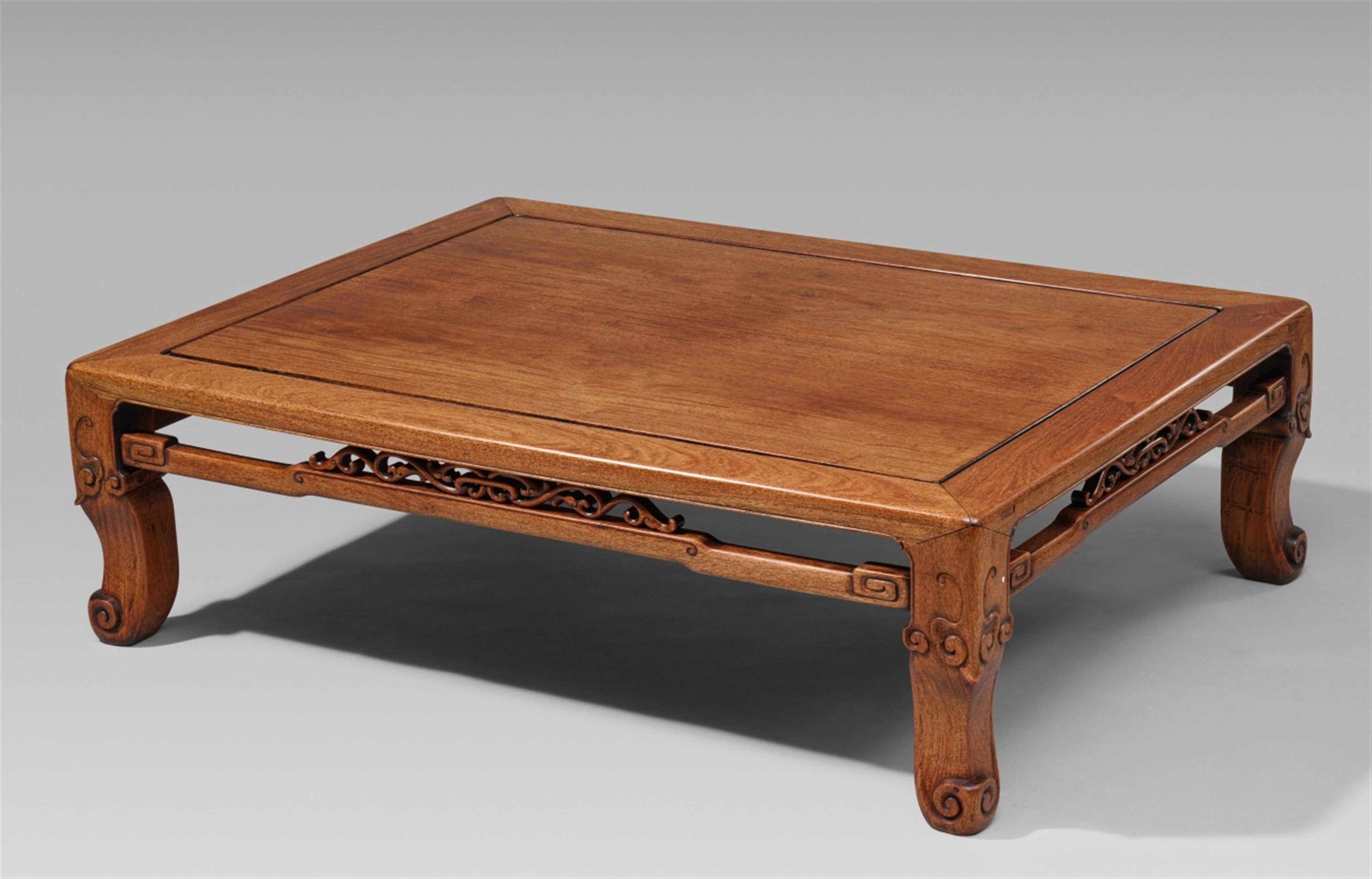 A very large low hardwood table - image-1