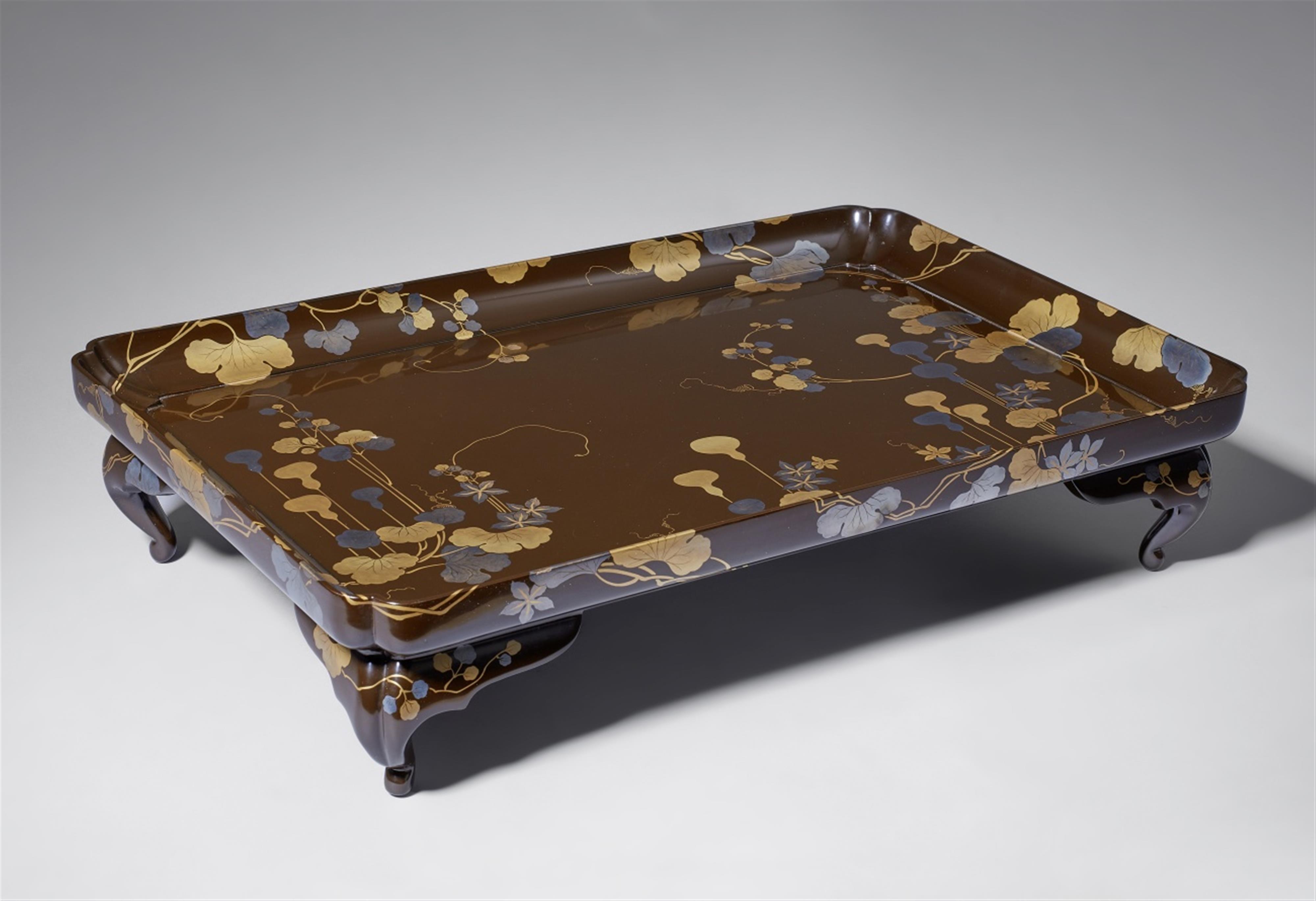 A black lacquer footed tray. 20th century - image-1