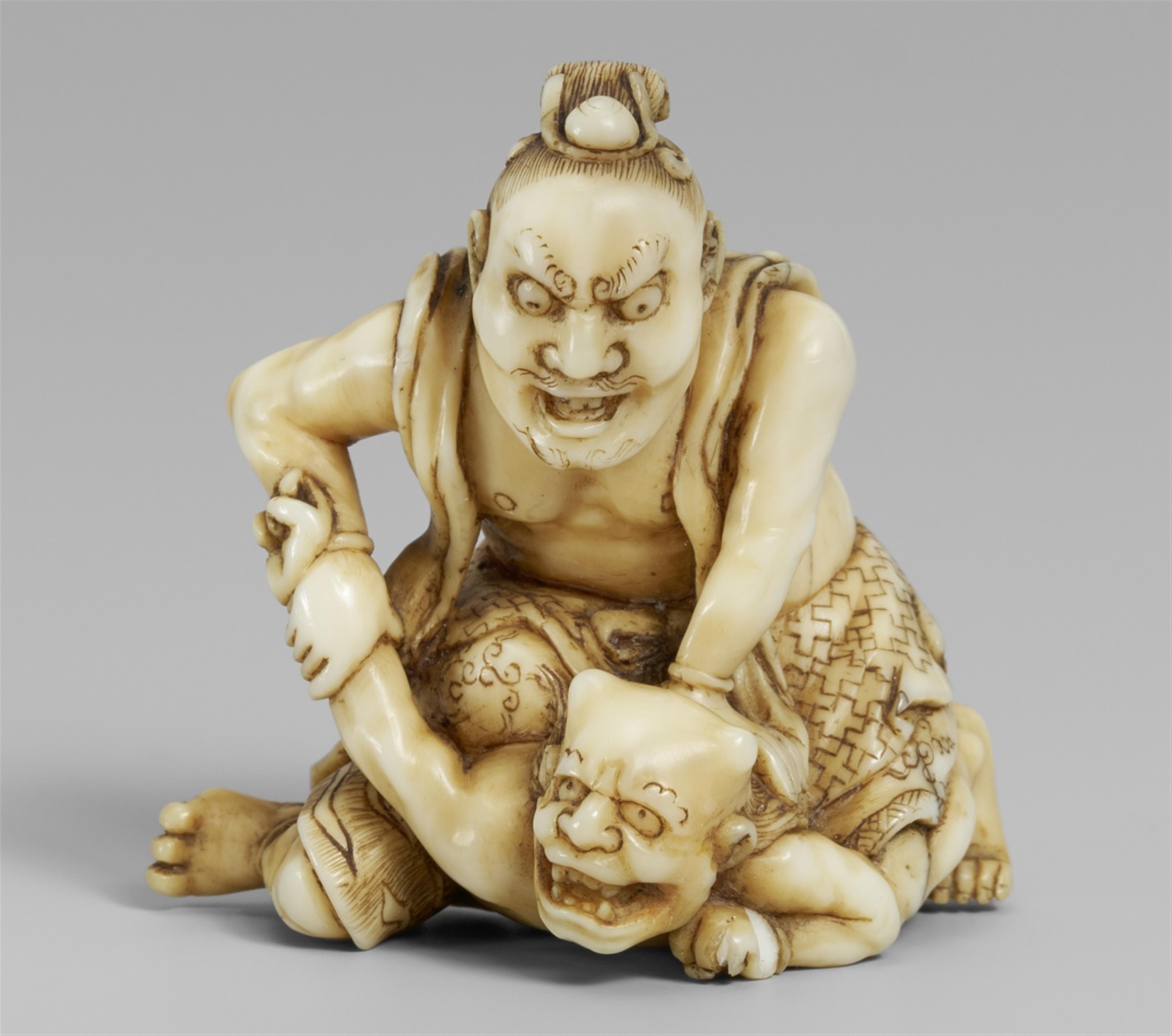 An ivory netsuke of a Nio und oni, by Hikaku. 19th century - image-1