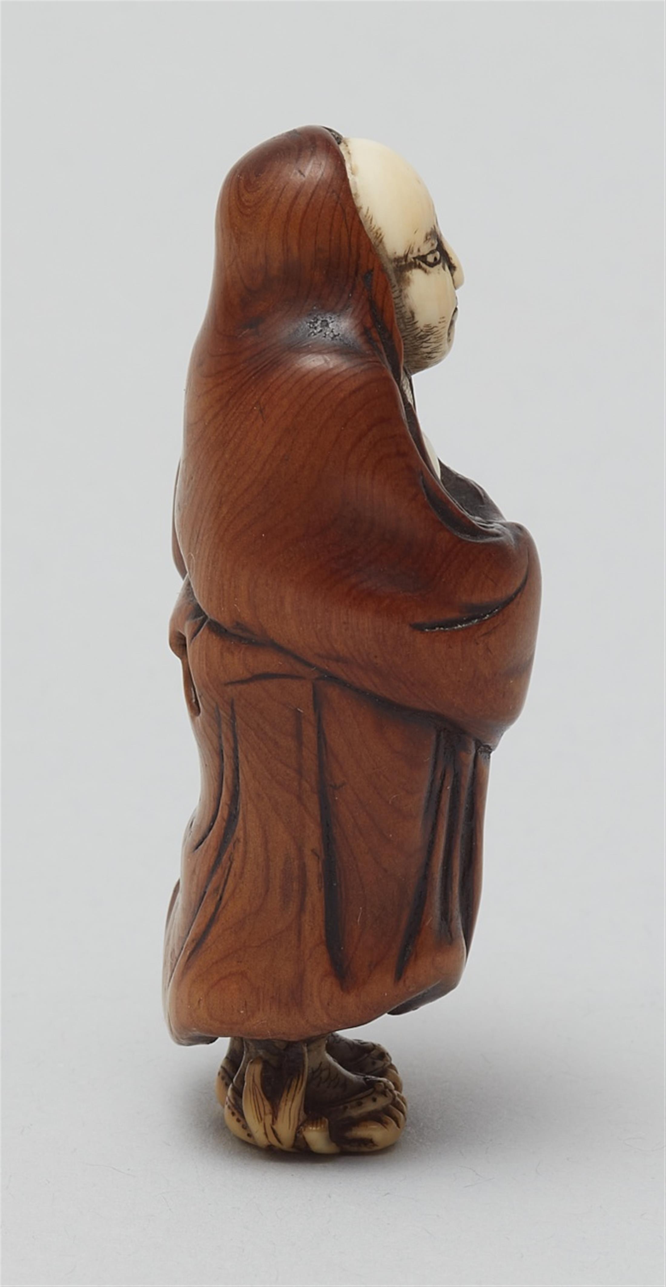 A wood and ivory netsuke of Daruma. Mid-19th century - image-2