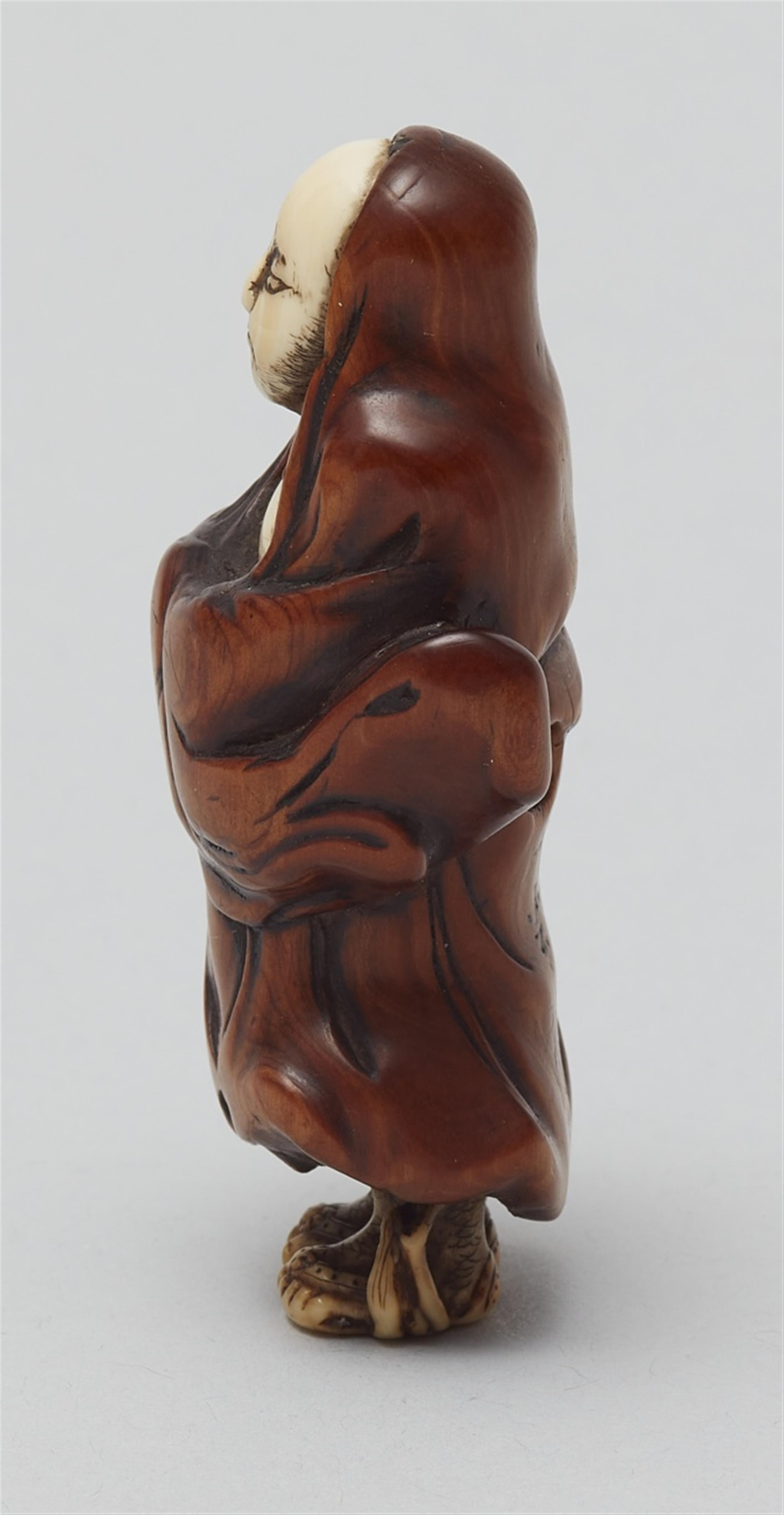 A wood and ivory netsuke of Daruma. Mid-19th century - image-4