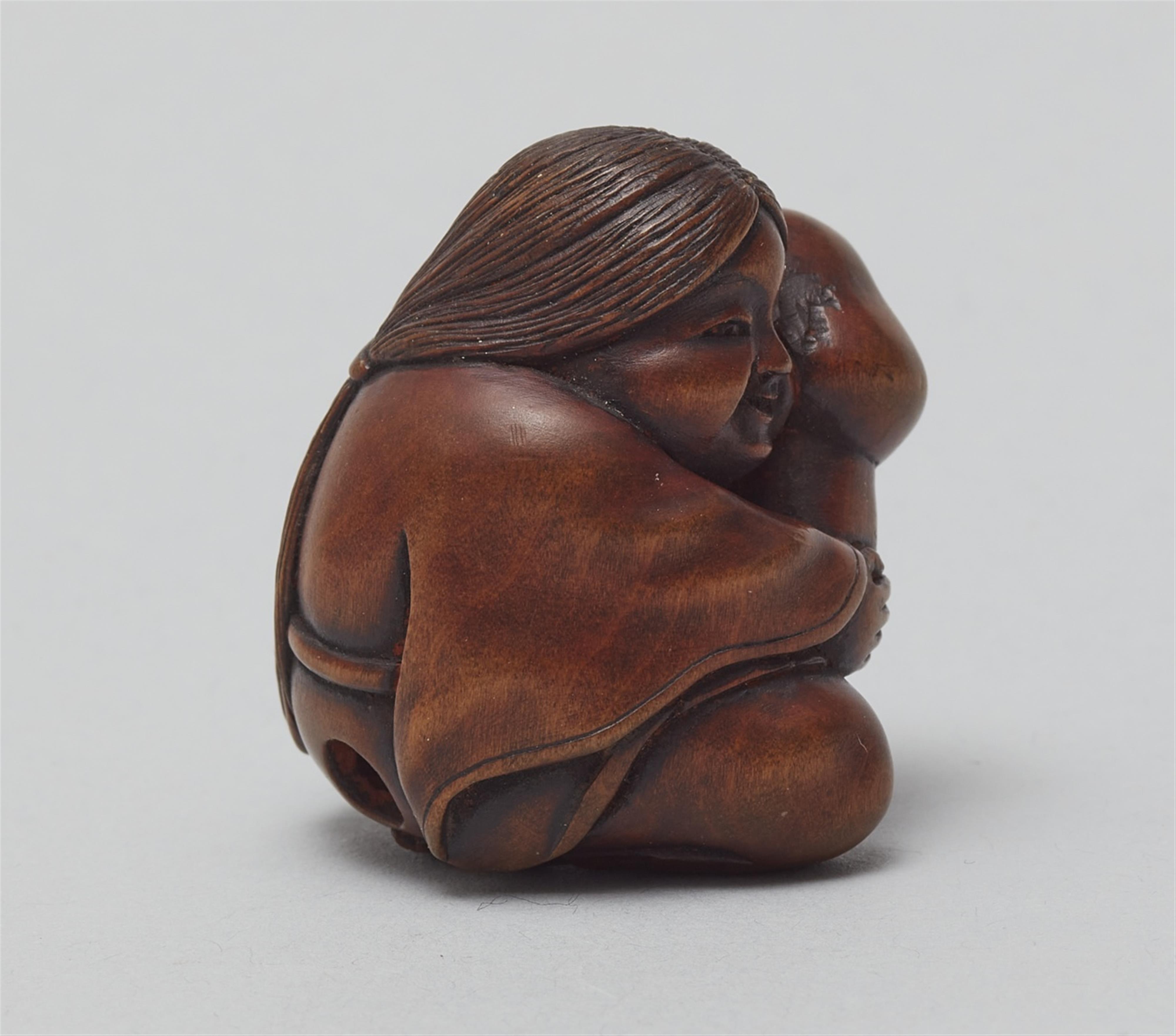 A boxwood shunga netsuke of Okame. 19th century - image-2