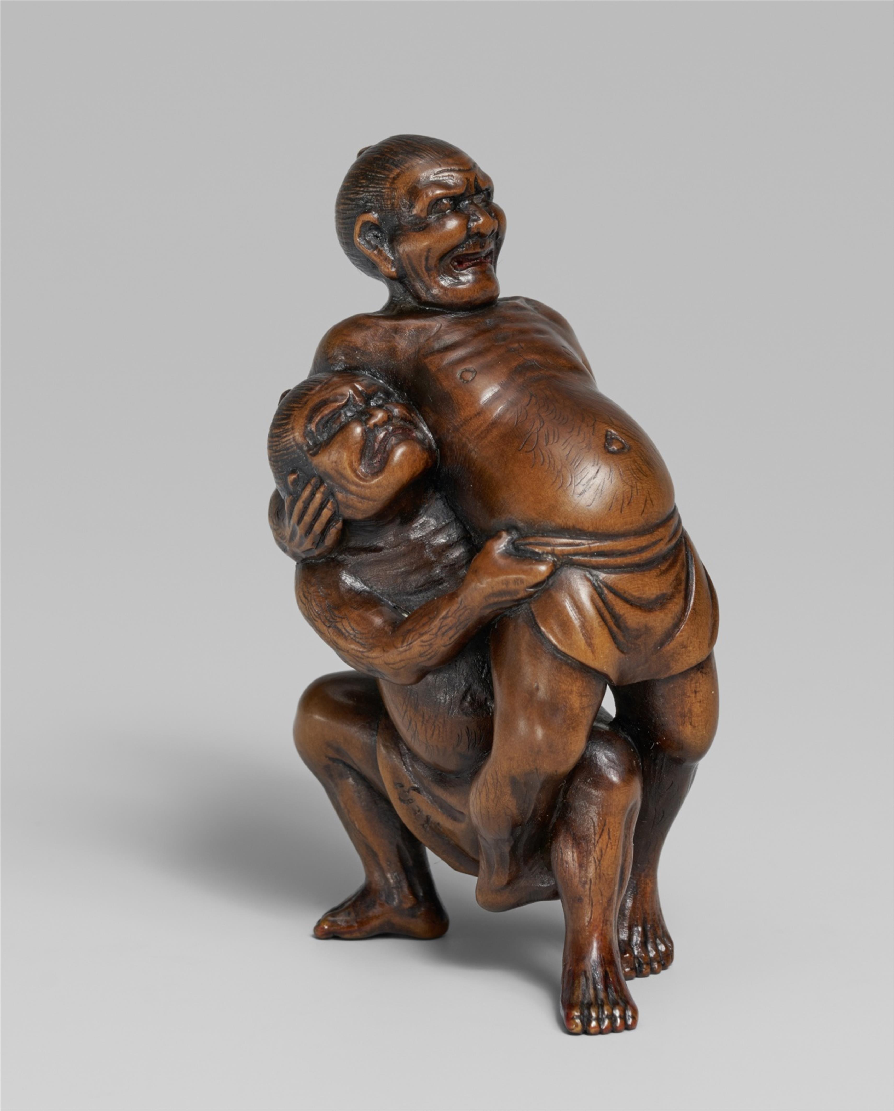 A boxwood okimono netsuke of two wrestlers, by Unhodo Masayoshi. Late 19th century - image-1