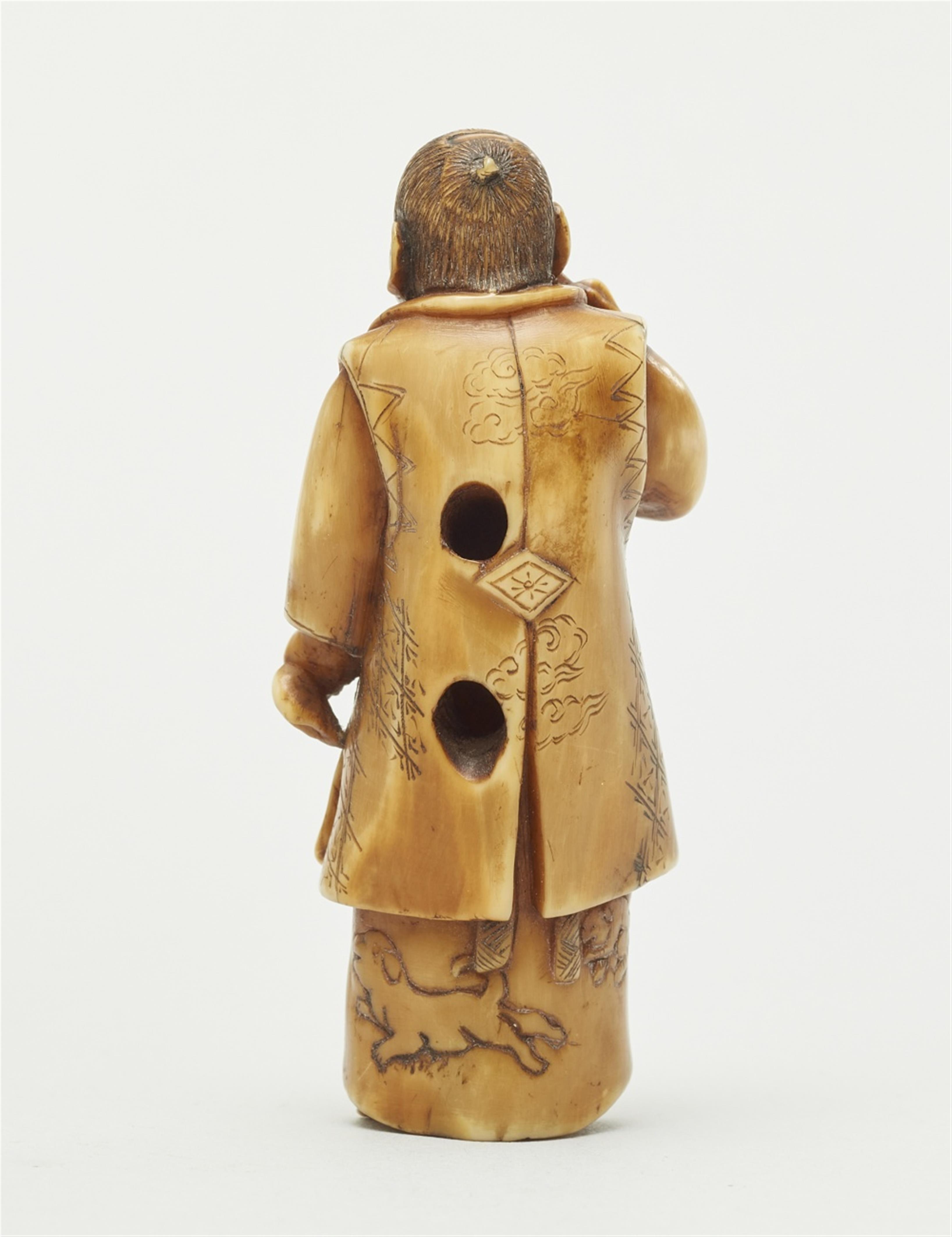 An ivory netsuke of a boy with a hozuki. Late 19th century - image-2