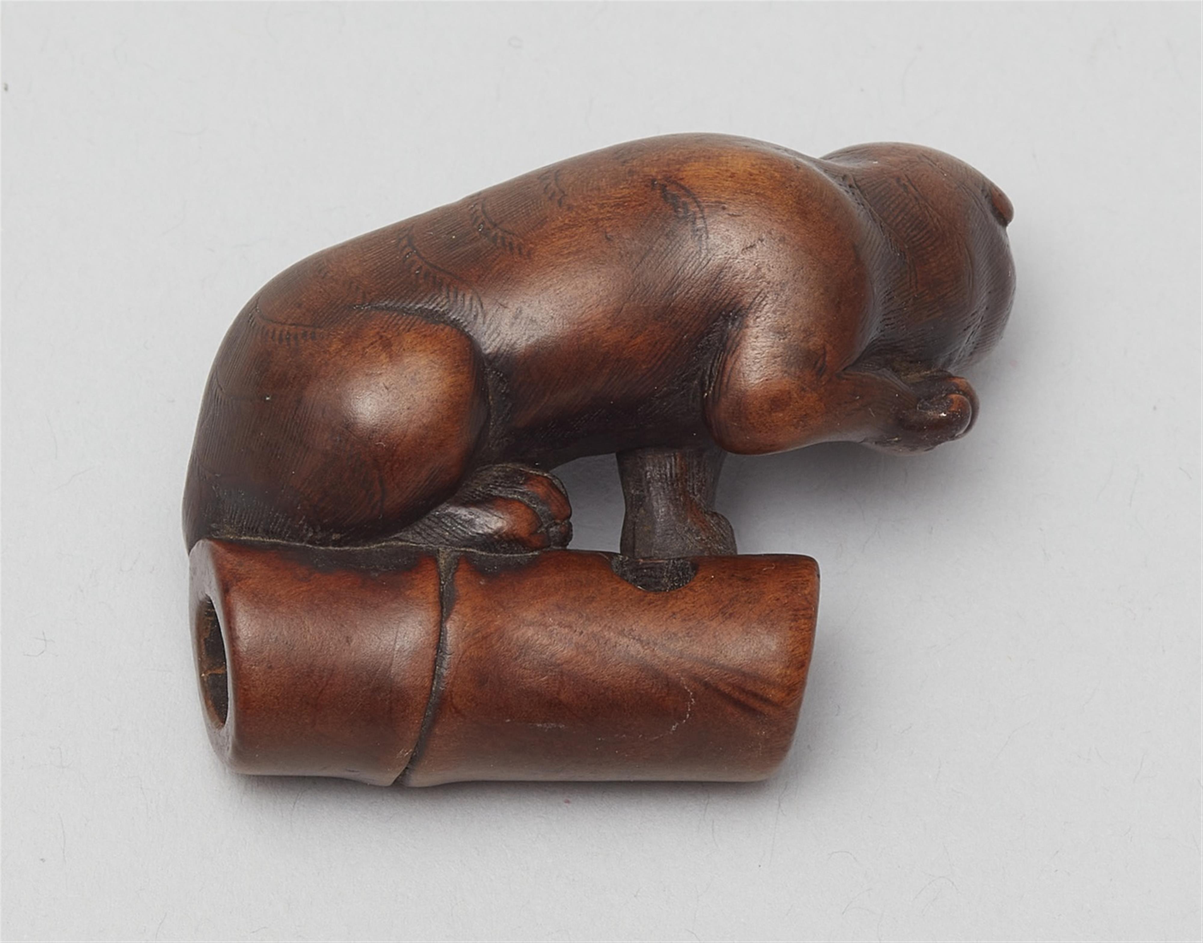 A boxwood netsuke of a tiger on bamboo. First half 19th century - image-2