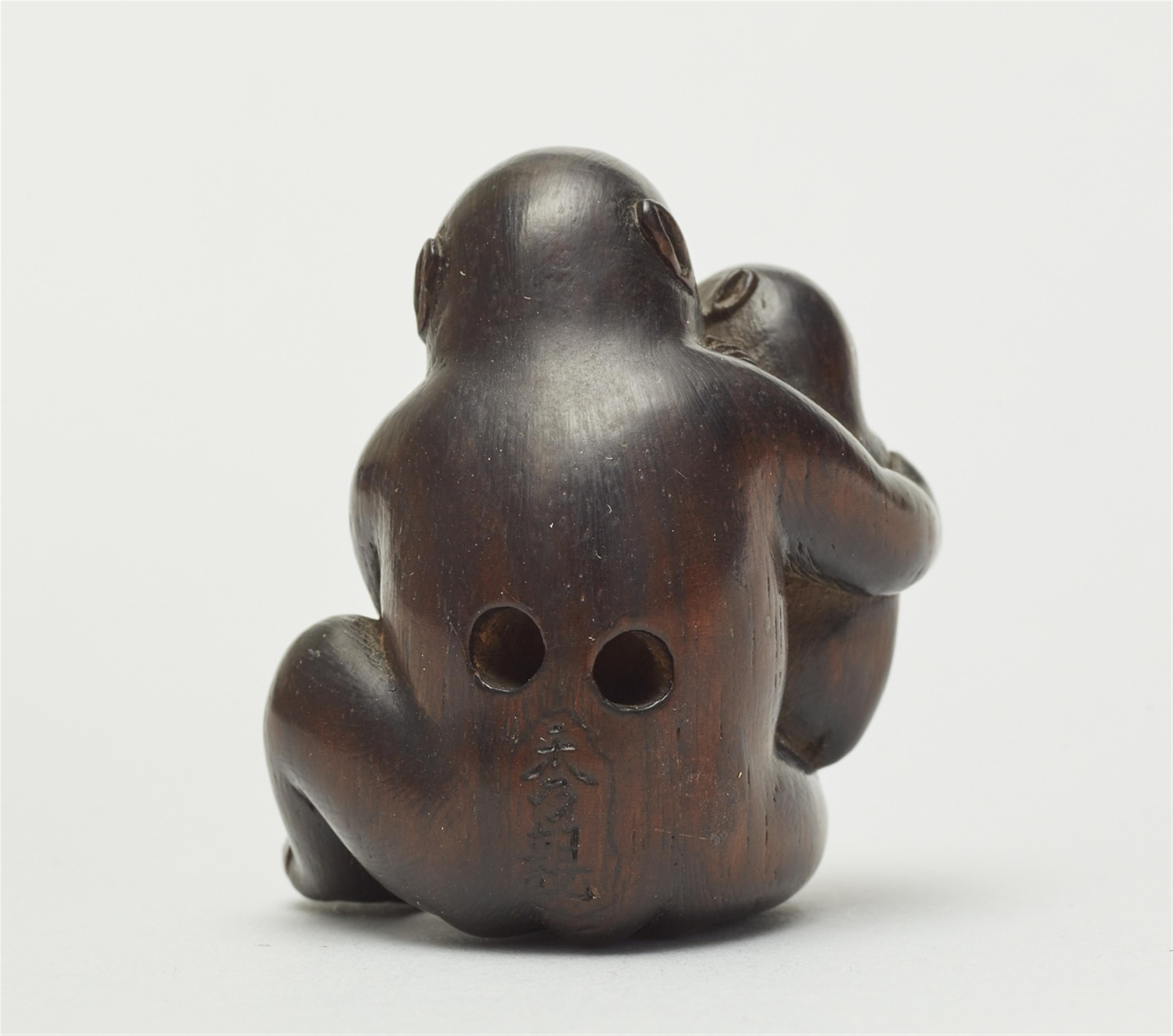 A reddish cherry wood netsuke of two monkeys, by Hidechika. Mid-19th century - image-2