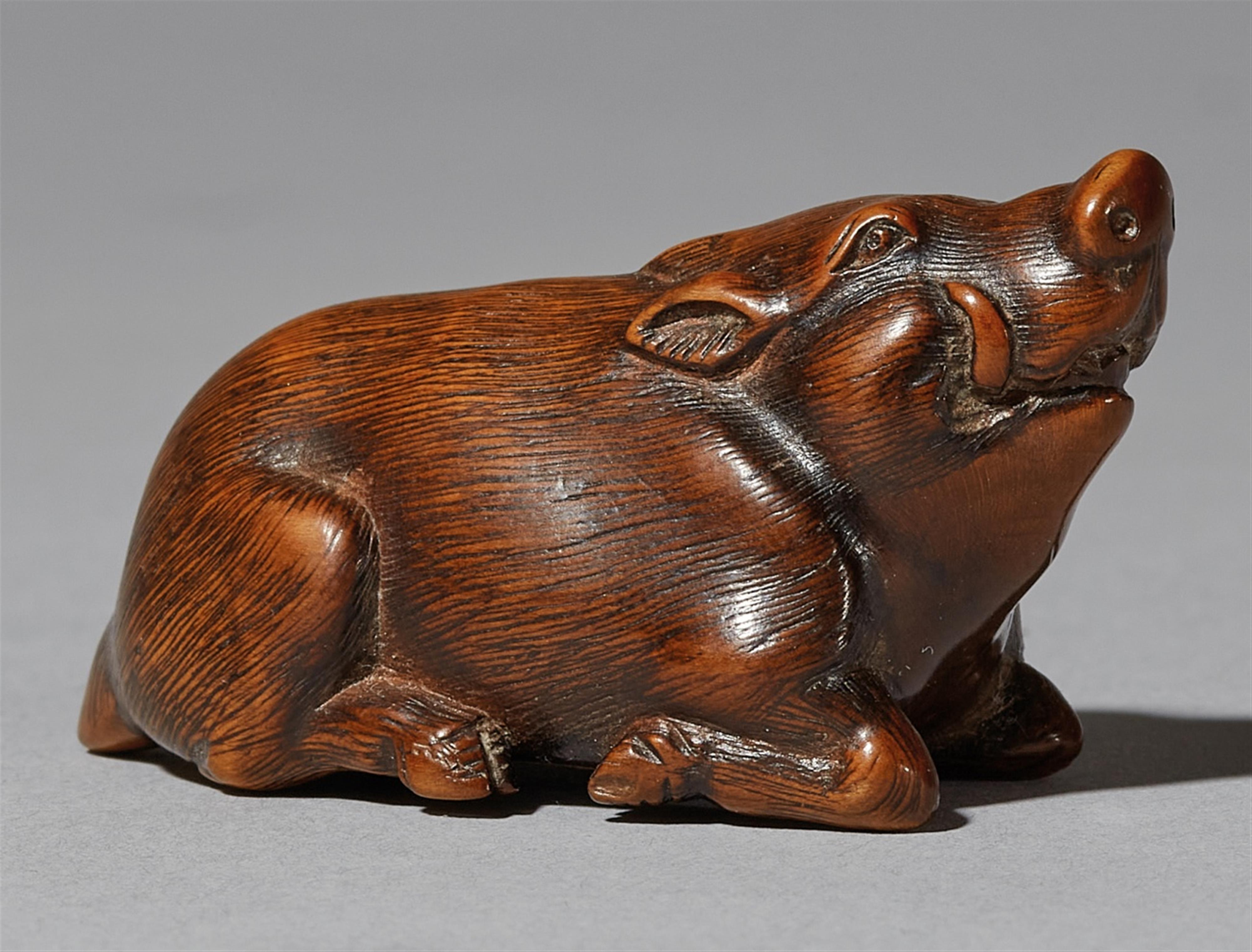 A boxwood netsuke of a boar. 19th century - image-1