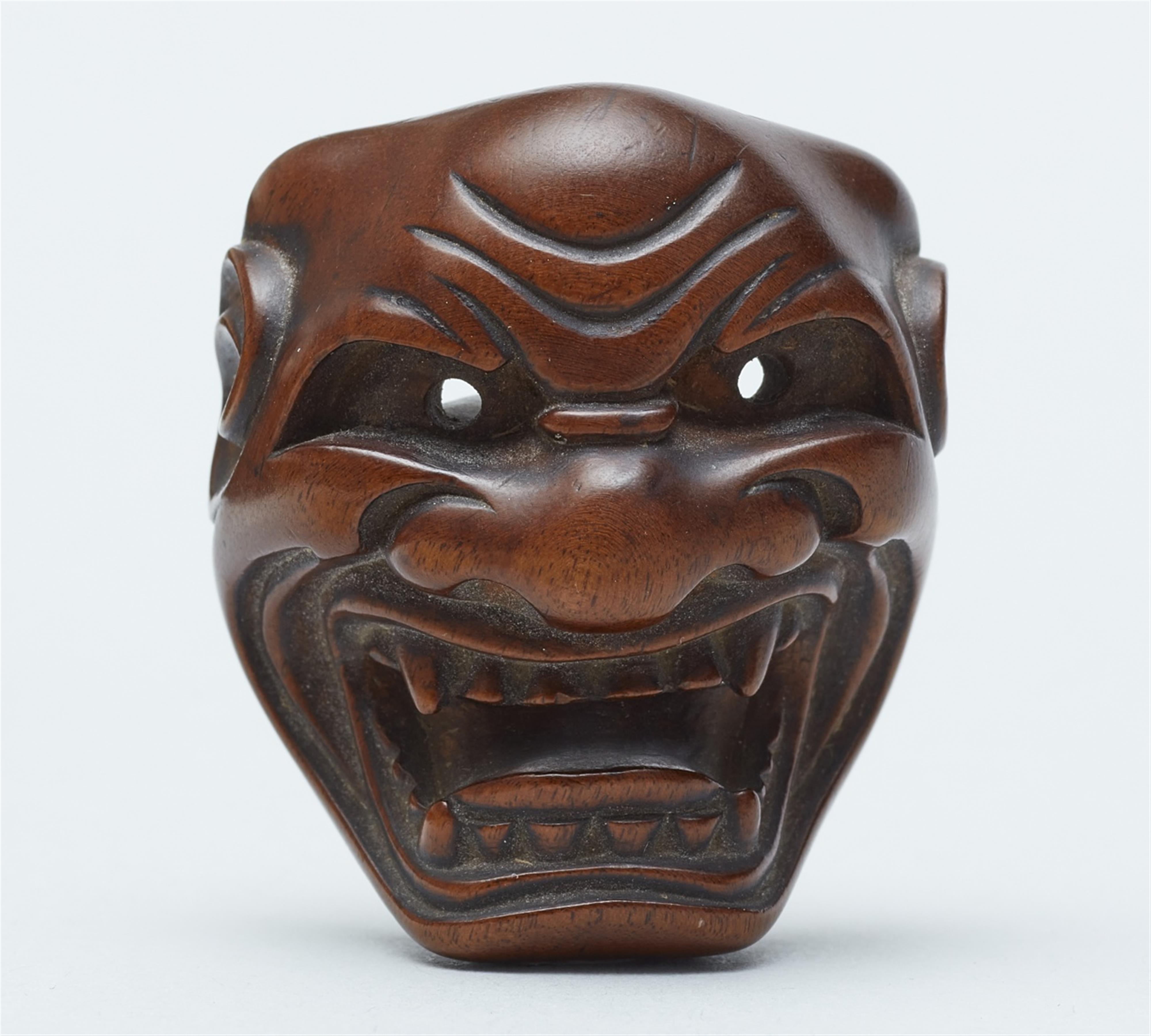 A boxwood netsuke of a Shishiguchi mask. 19th century - image-2