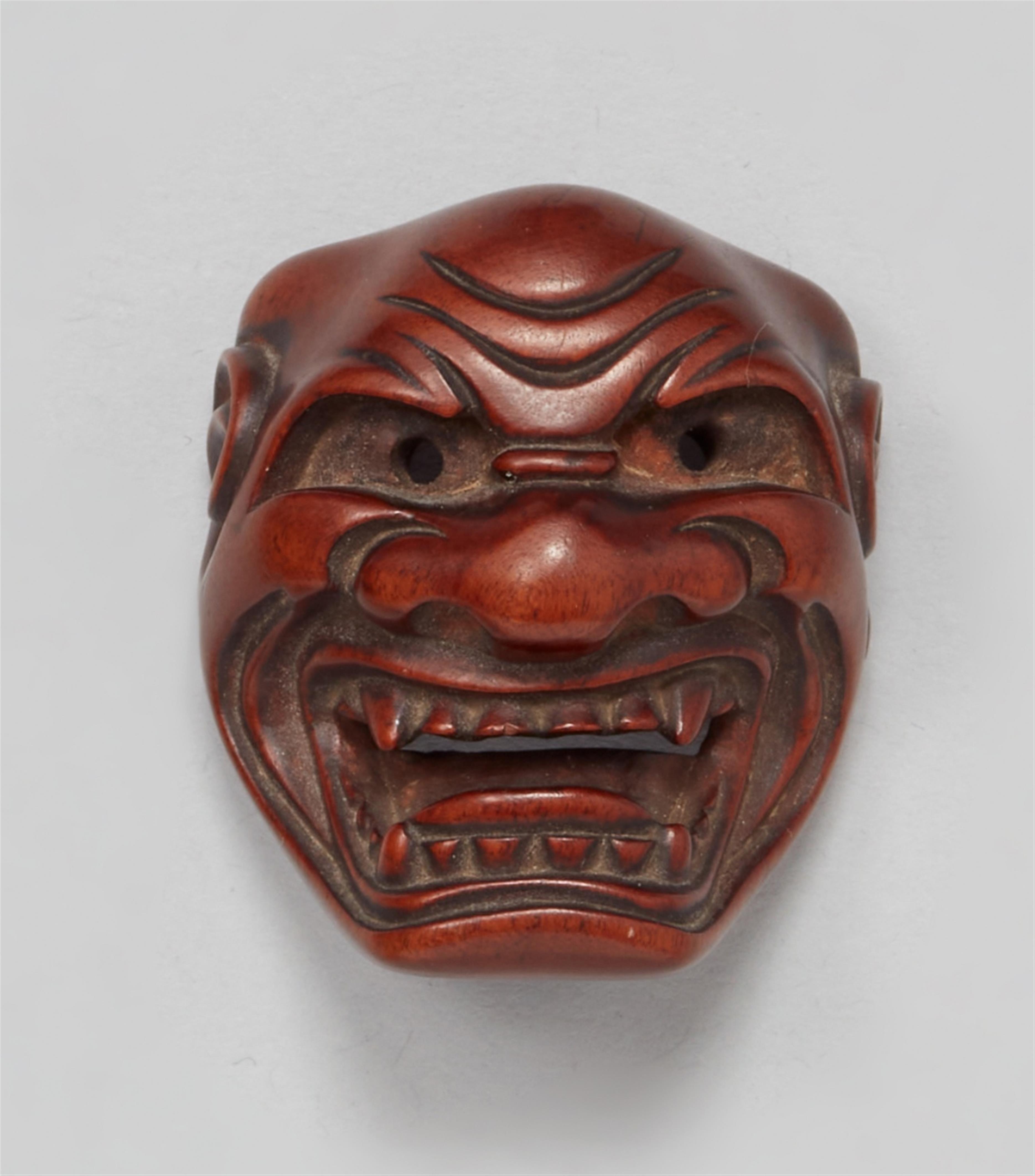 A boxwood netsuke of a Shishiguchi mask. 19th century - image-1