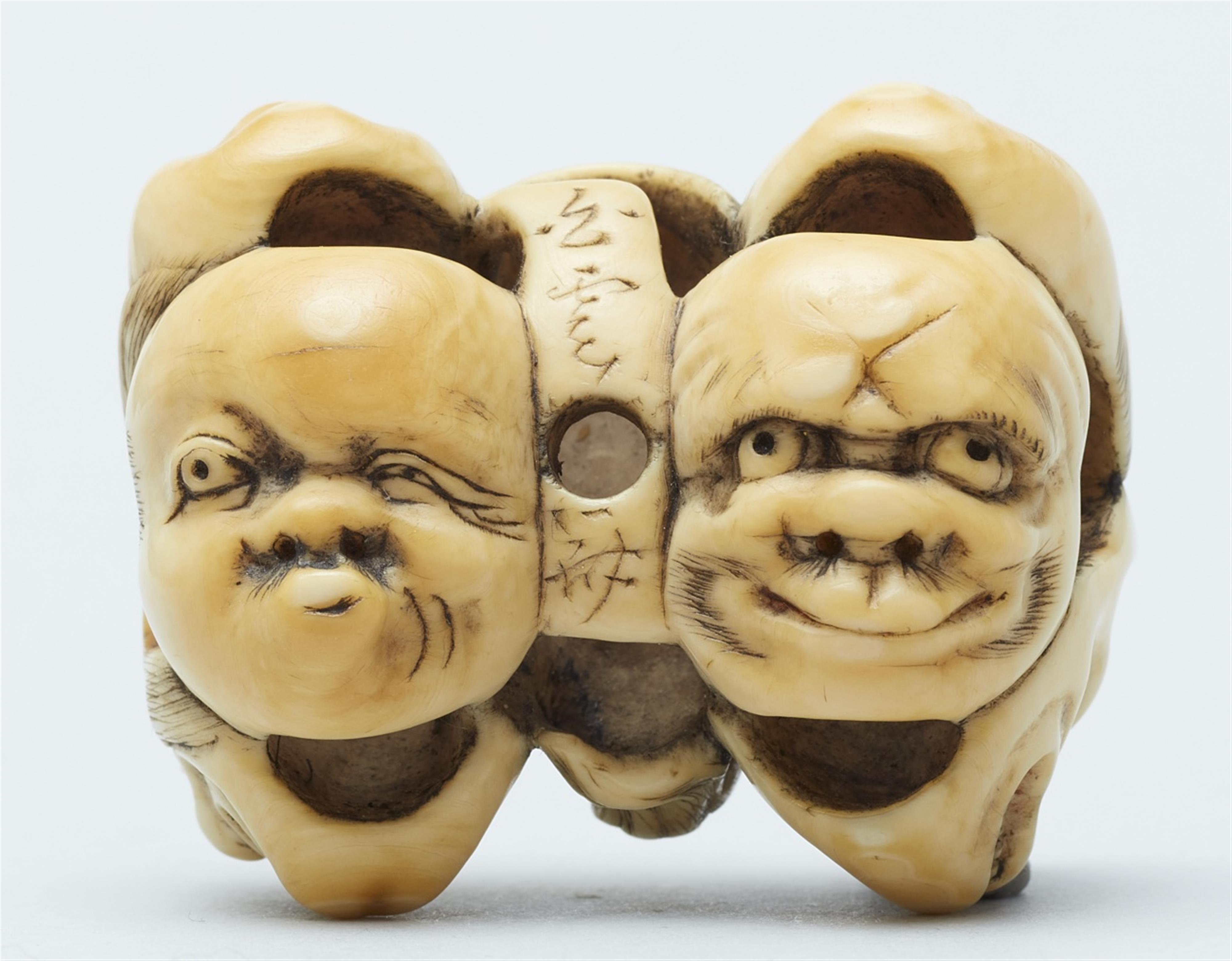 An ivory netsuke of a group of masks. Mid-19th century - image-2