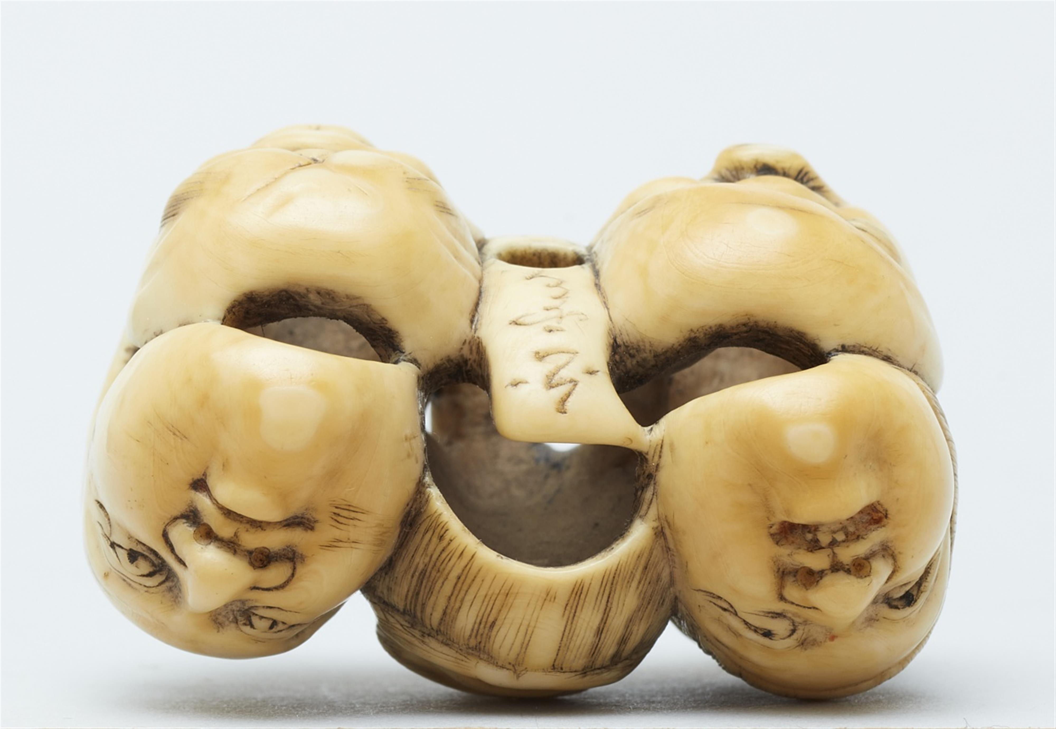 An ivory netsuke of a group of masks. Mid-19th century - image-4