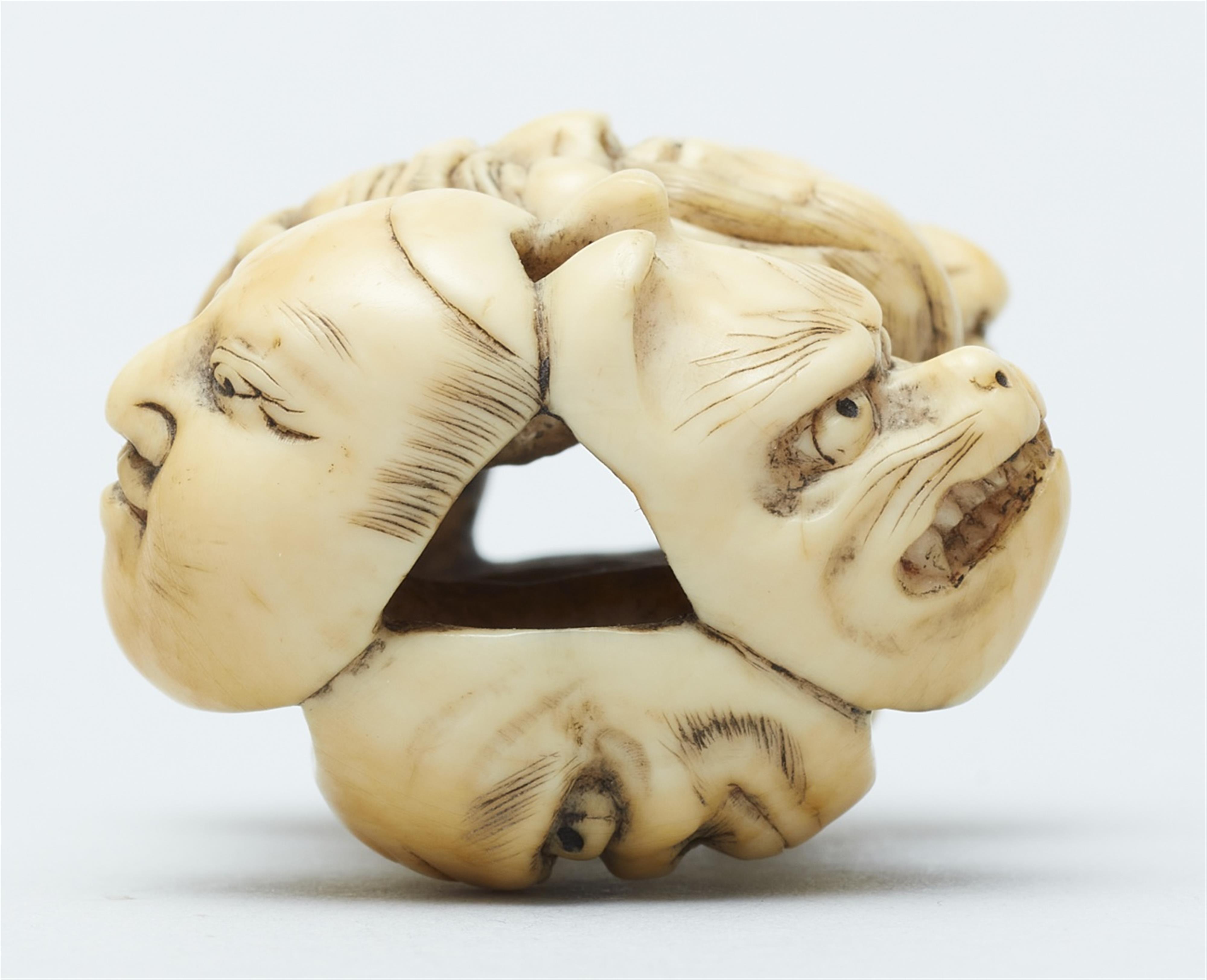 An ivory netsuke of a group of masks. Mid-19th century - image-6