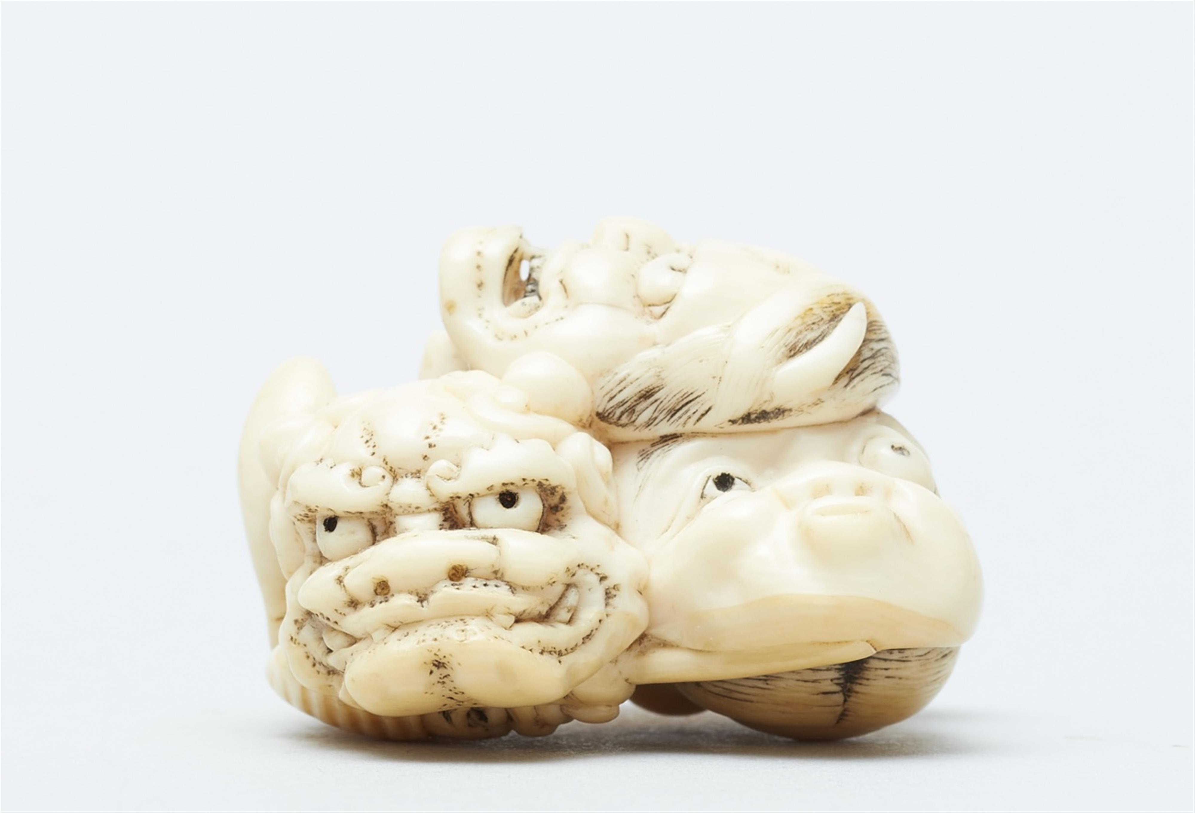 An ivory netsuke of a group of masks. Mid-19th century - image-4