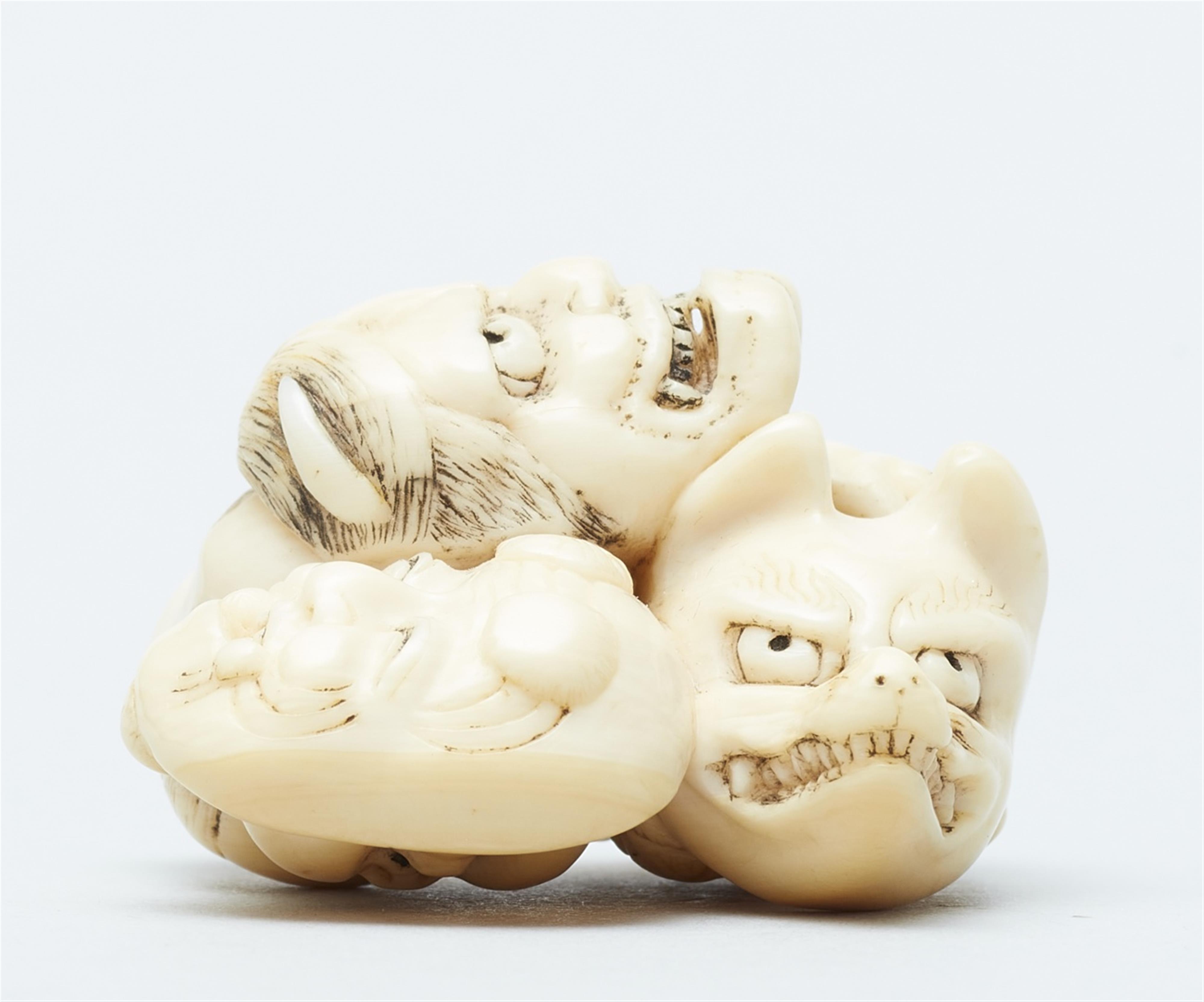 An ivory netsuke of a group of masks. Mid-19th century - image-6