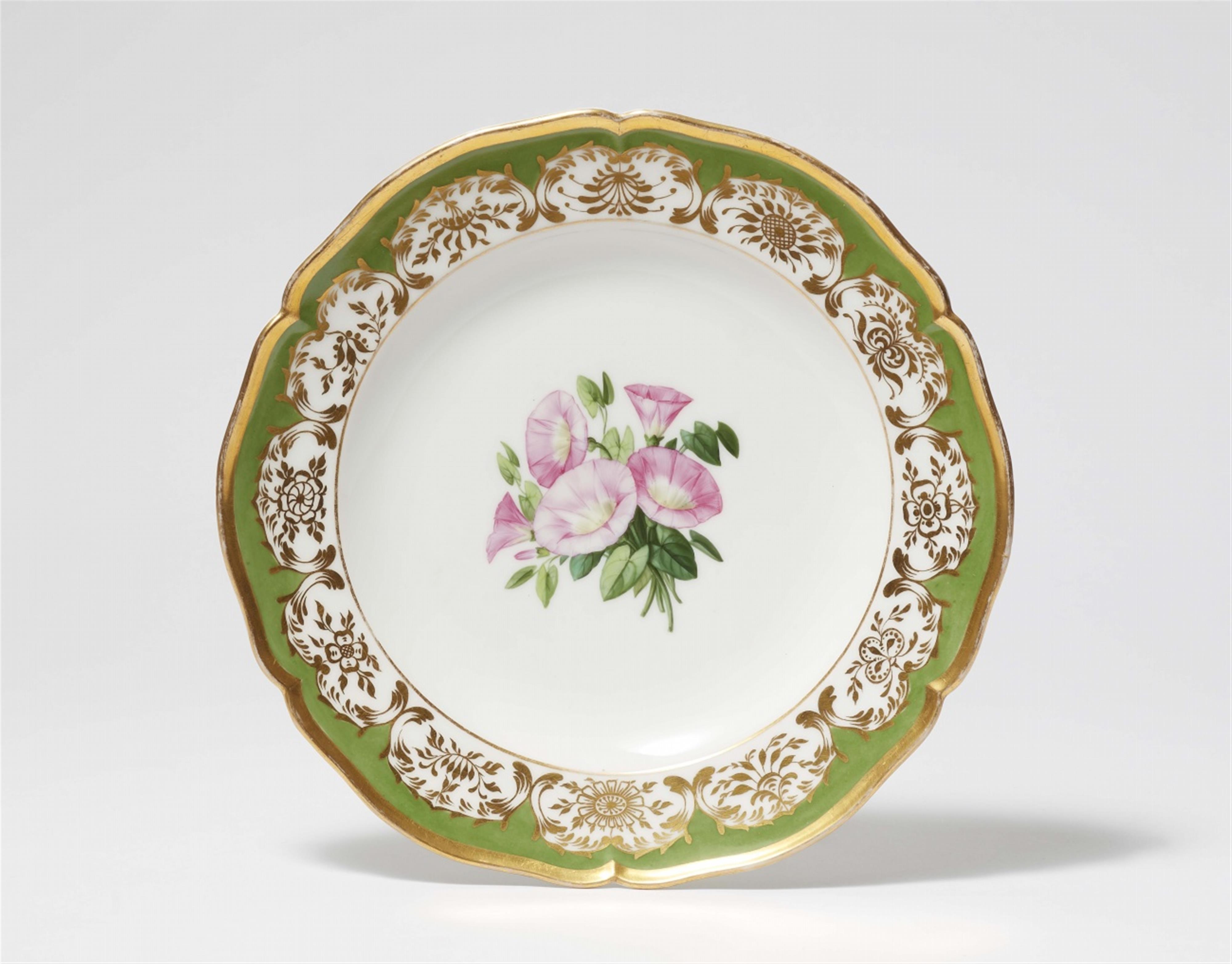 A Berlin KPM porcelain dinner plate from a service with morning glory decor - image-1