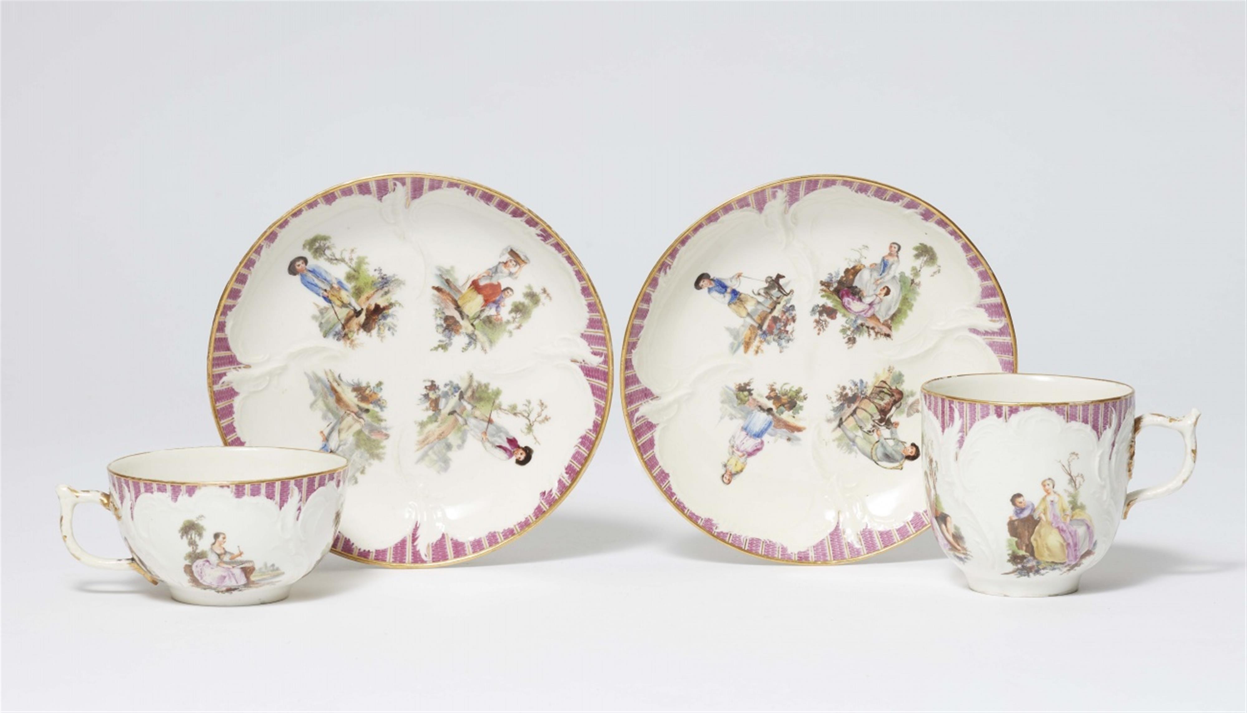 Two Berlin KPM porcelain cups and saucers with rustic figures - image-1
