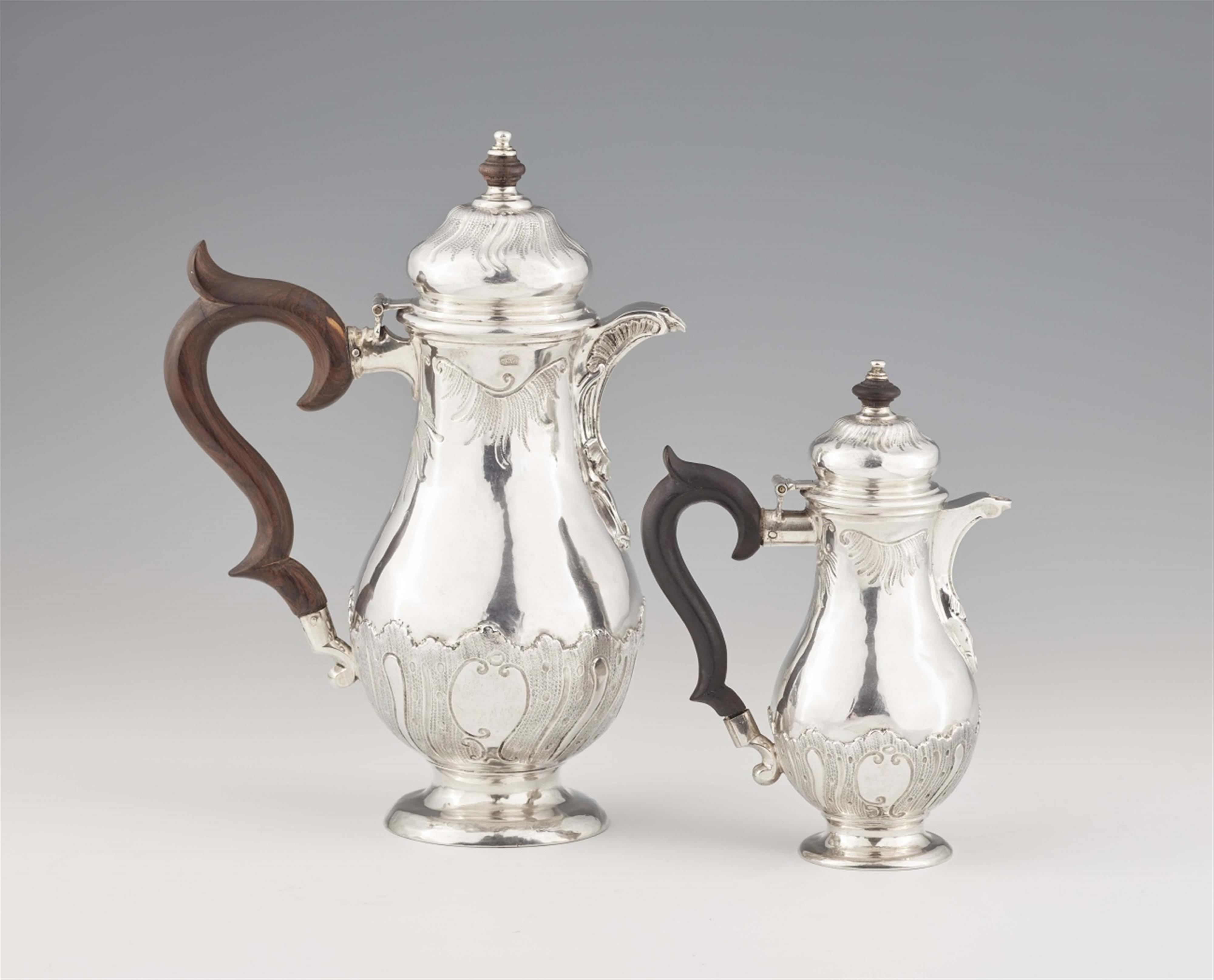 A pair of Berlin silver jugs - image-1