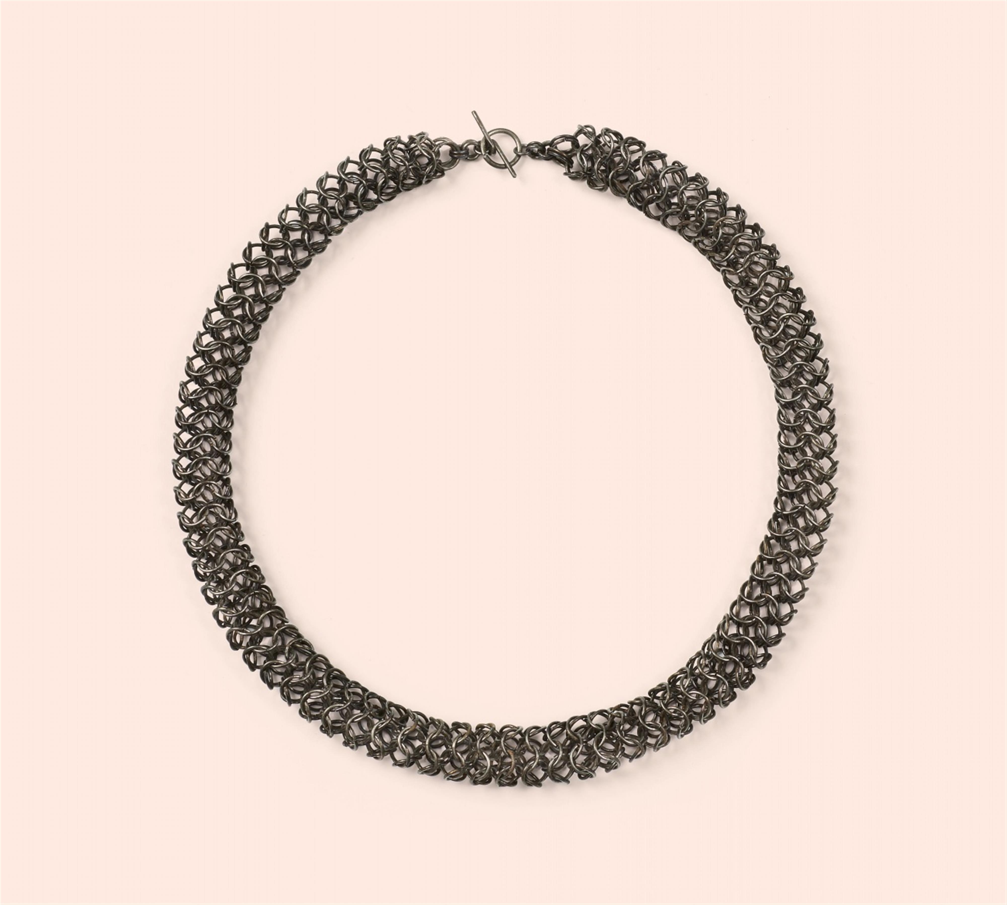 A steel necklace - image-1