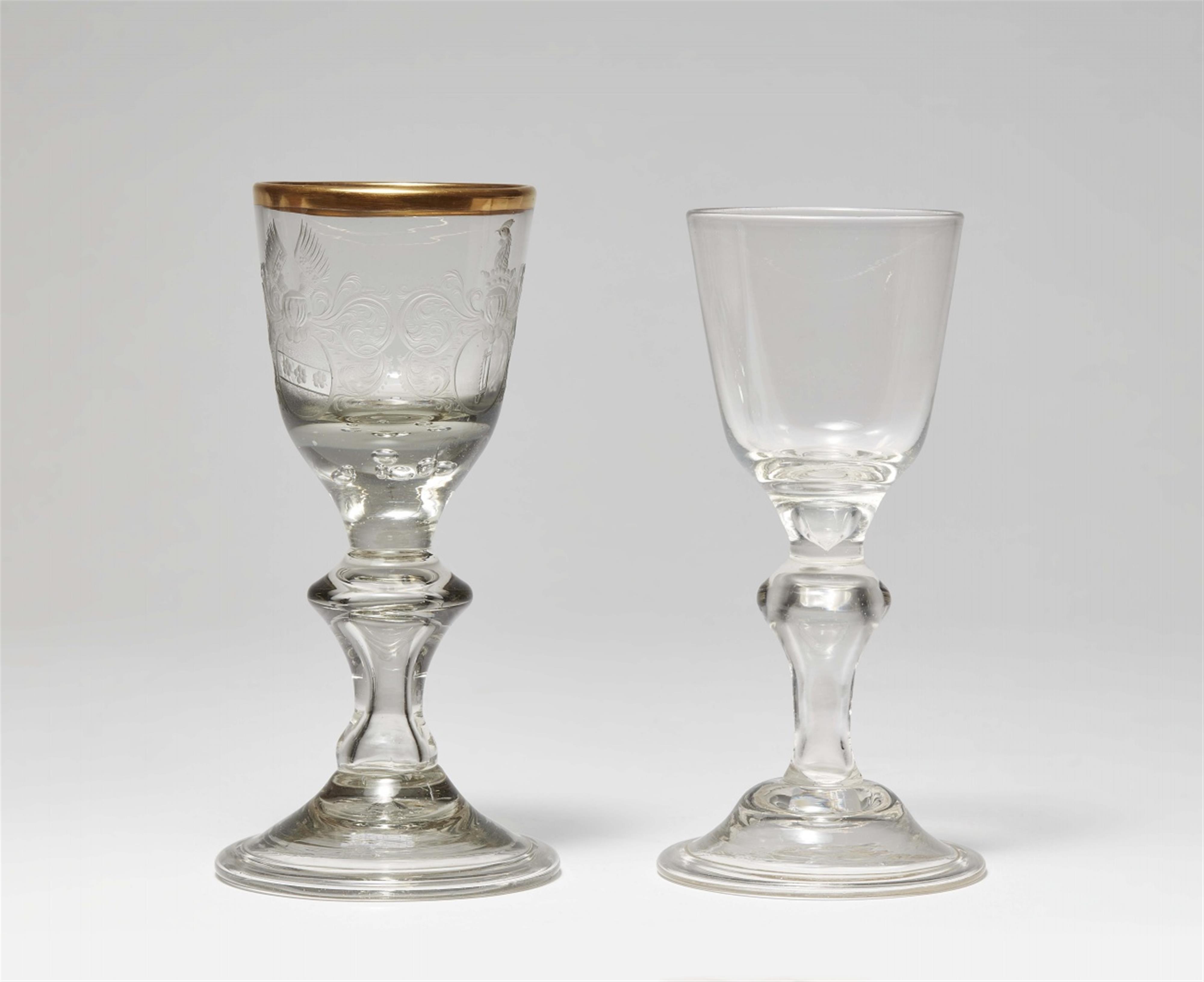 A cut glass goblet with two coats-of-arms - image-1