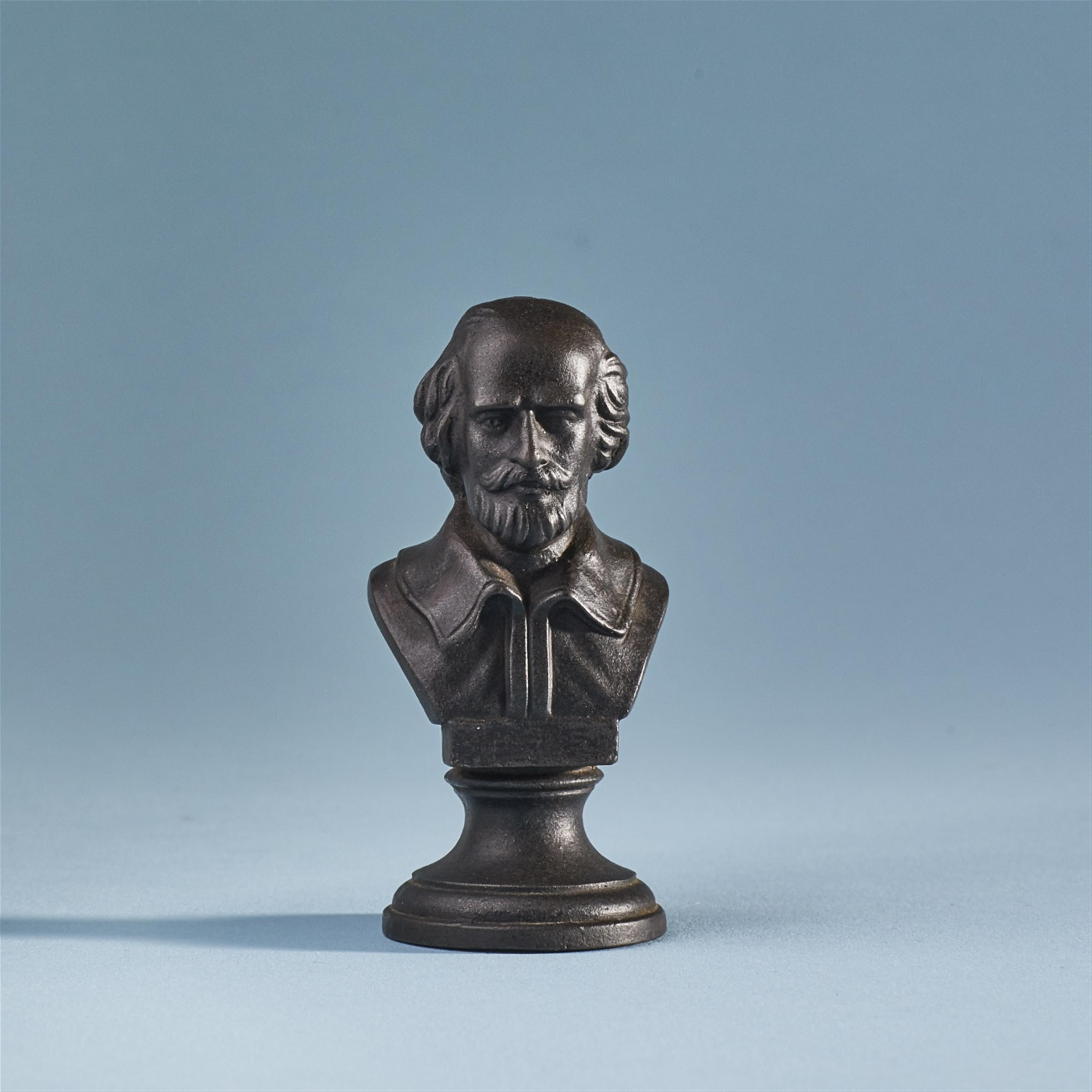 A small cast iron bust of William Shakespeare - image-1