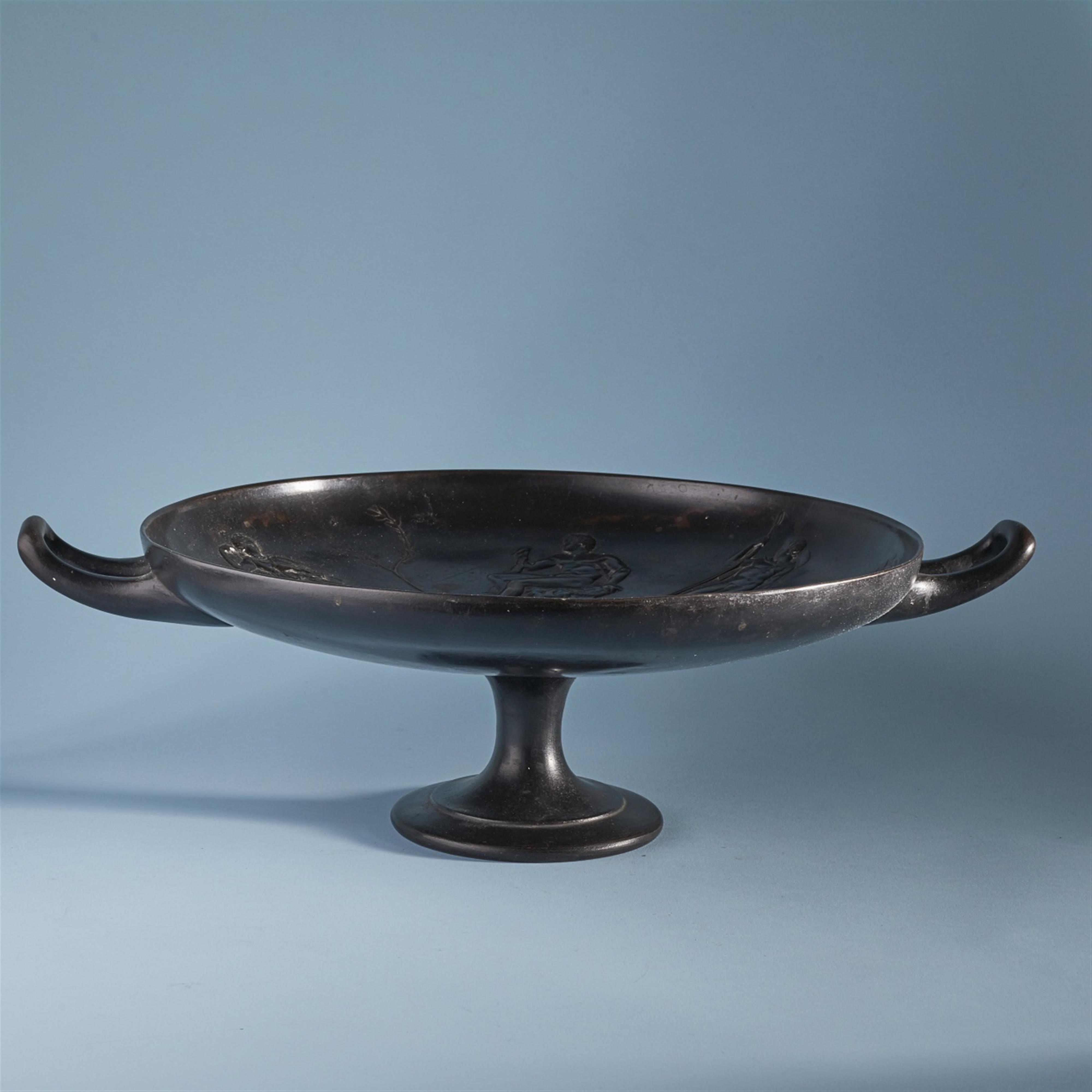 A cast iron kylix-form dish - image-1